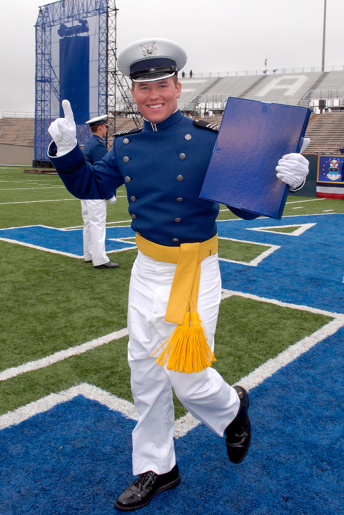 Newly-graduated 2nd Lt. Shaun Carney celebrates during the U.S. Air Force Academy Class of 2008 Graduation Ceremony at Falcon Stadium May 28.  Lieutenant Carney was the starting quarterback for the Academy football team.  The Class of 2008, the 50th Academy class, comprised 1,012 cadets who will enter the Air Force as second lieutenants. (U.S. Air Force photo/Mike Kaplan)