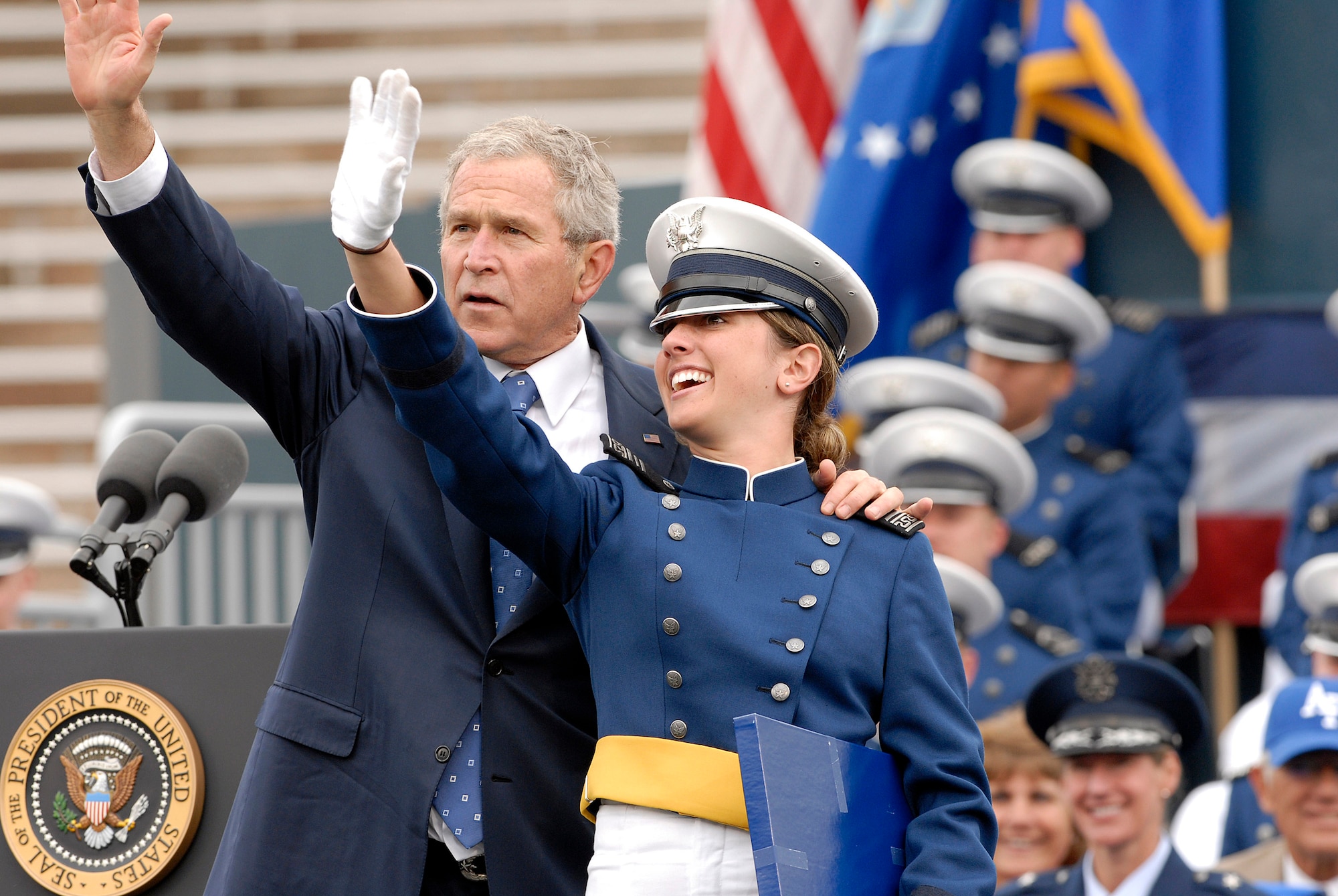 President George W. Bush waves to the family of newly-graduated 2nd Lt. Katie Newkirk during the U.S. Air Force Academy Class of 2008 Graduation Ceremony at Falcon Stadium May 28.   The Class of 2008, the 50th Academy class, comprised 1,012 cadets who will enter the Air Force as second lieutenants.  (U.S. Air Force photo/Mike Kaplan)