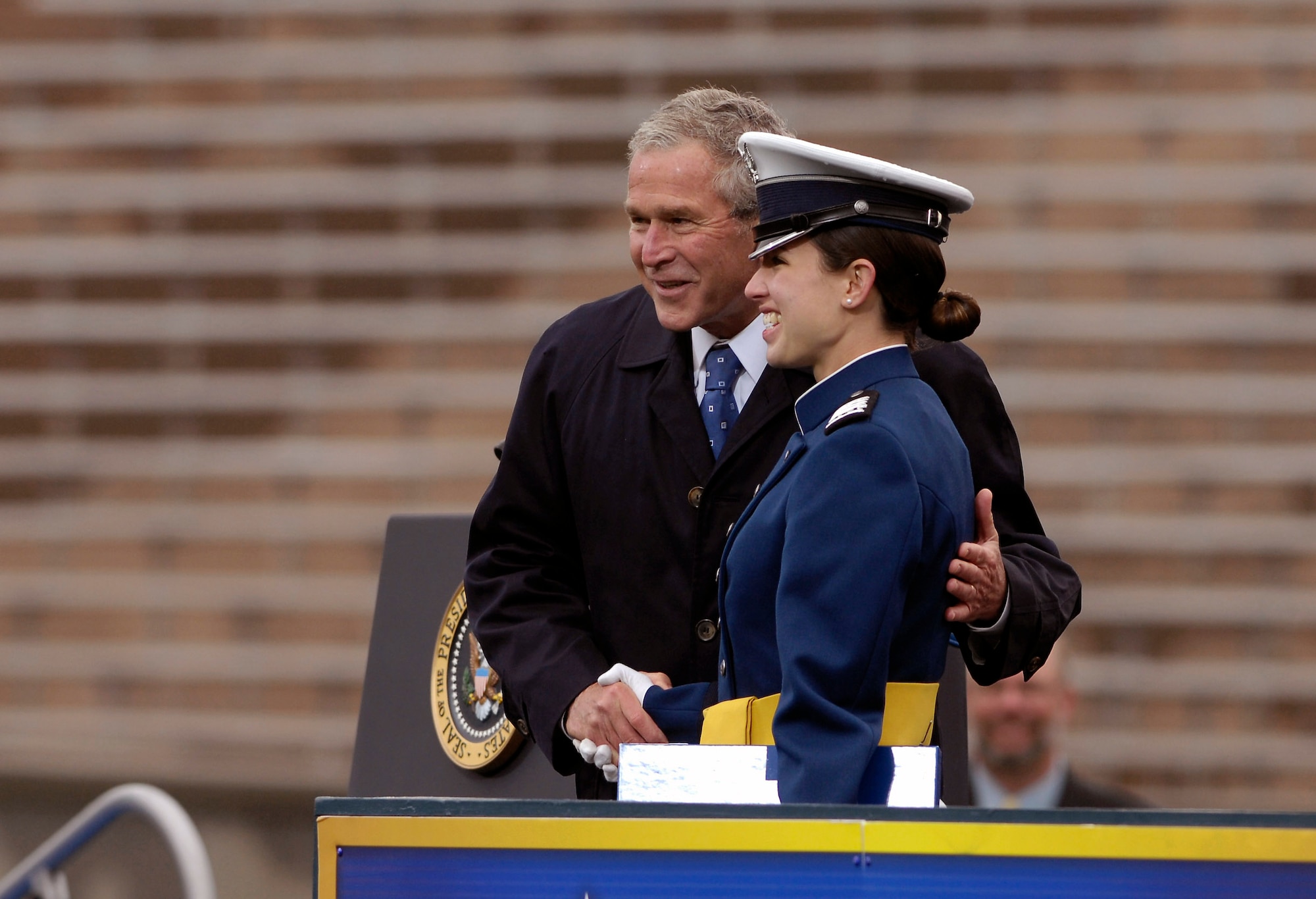 President George W. Bush congratulates newly-graduated 2nd Lt. Hila Levy during the U.S. Air Force Academy Class of 2008 Graduation Ceremony May 28 at Falcon Stadium.  Lieutenant Levy is the top graduate in her class and was selected as a Rhodes Scholar. The Class of 2008, the 50th Academy class, comprised 1,012 cadets who will enter the Air Force as second lieutenants. (U.S. Air Force photo/Mike Kaplan)
