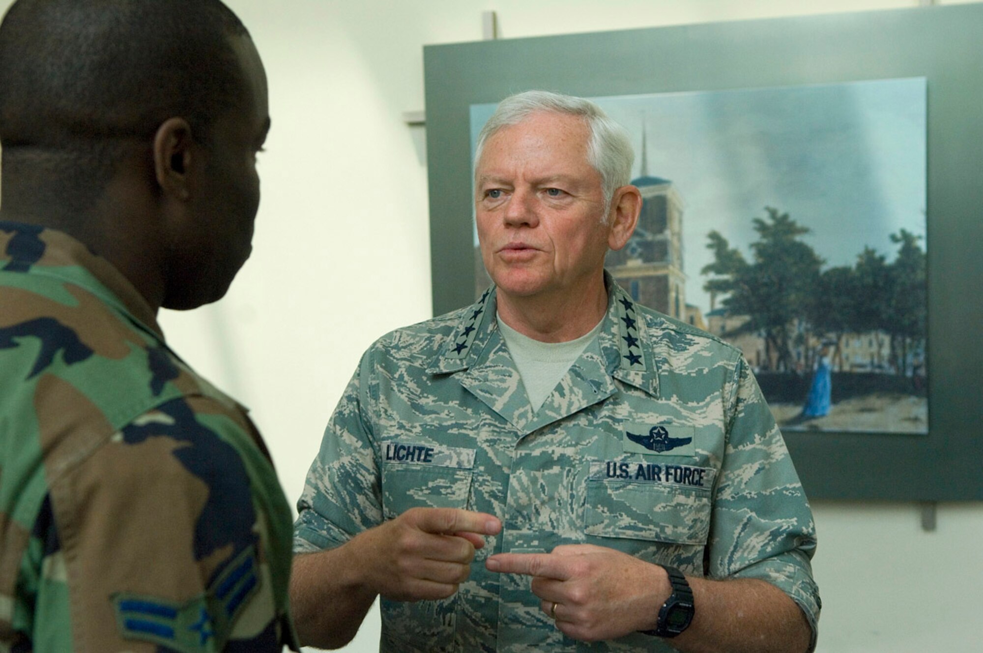 Gen. Arthur J. Lichte, Air Mobility Command commander, speaks with Airmen after a luncheon during Air Force Day at Independence Hall in Philadelphia, May 27, in conjunction with Air Force Week - Philadelphia. The week is designed to broaden awareness of the U.S. Air Force's role in the war on terrorism and strengthen support for Airmen serving worldwide in defense of freedom. (U.S. Air Force photo/Staff Sgt. Bennie J. Davis III)