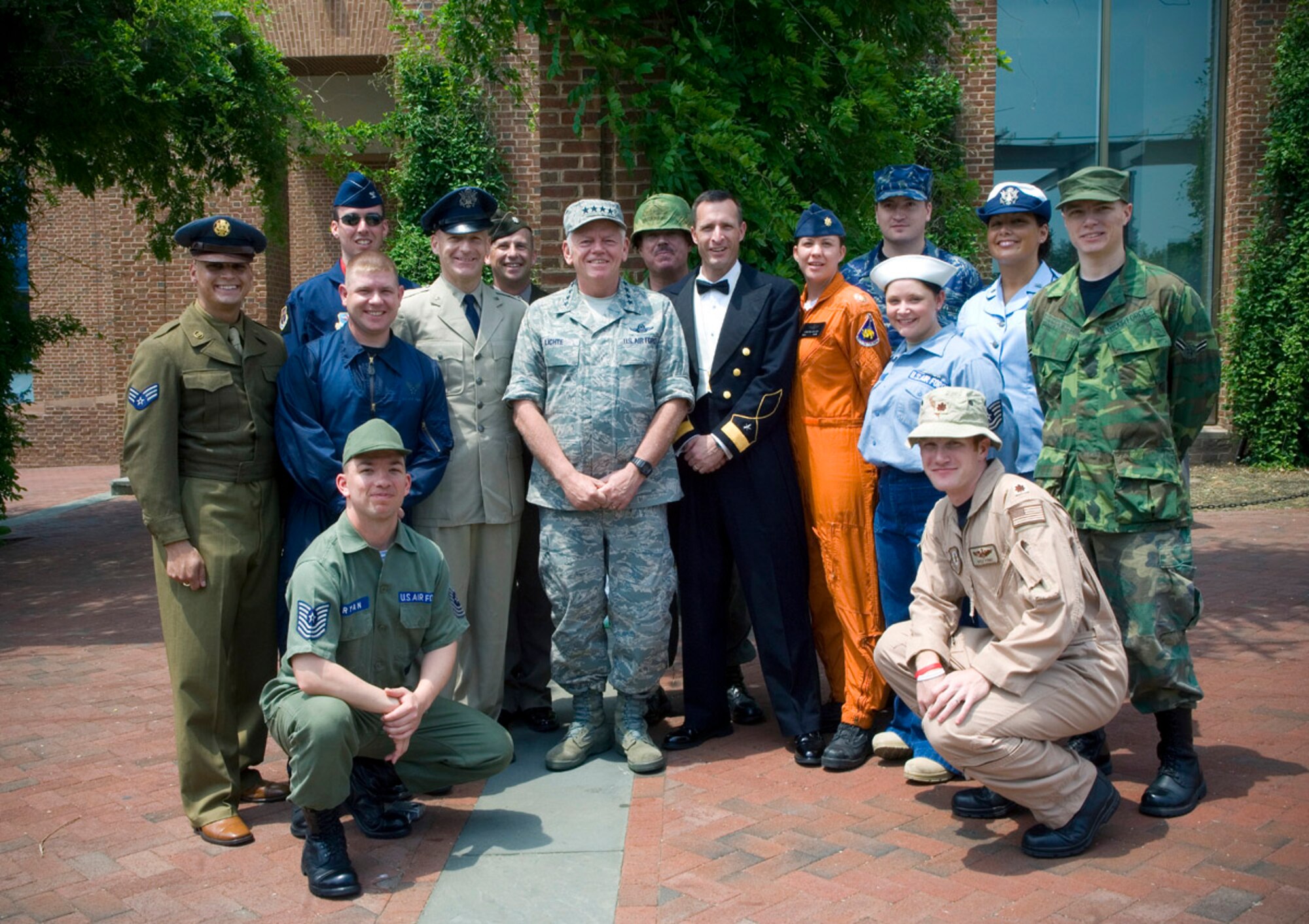 Gen. Arthur J. Lichte, Air Mobility Command commander, joins members of the Parade of Uniforms exhibit for a photo opportunity during Air Force Day at Independence Hall, May 27, in conjunction with Air Force Week - Philadelphia. The Parade of Uniforms exibit is the largest private collection of vintage Air Force uniforms owned and showcased by Tech. Sgt. Jack Waide stationed at Elmendorf Air Force Base, Alaska. The week is designed to broaden awareness of the U.S. Air Force's role in the war on terrorism and strengthen support for Airmen serving worldwide in defense of freedom. (U.S. Air Force photo/Staff Sgt. Bennie J. Davis III)