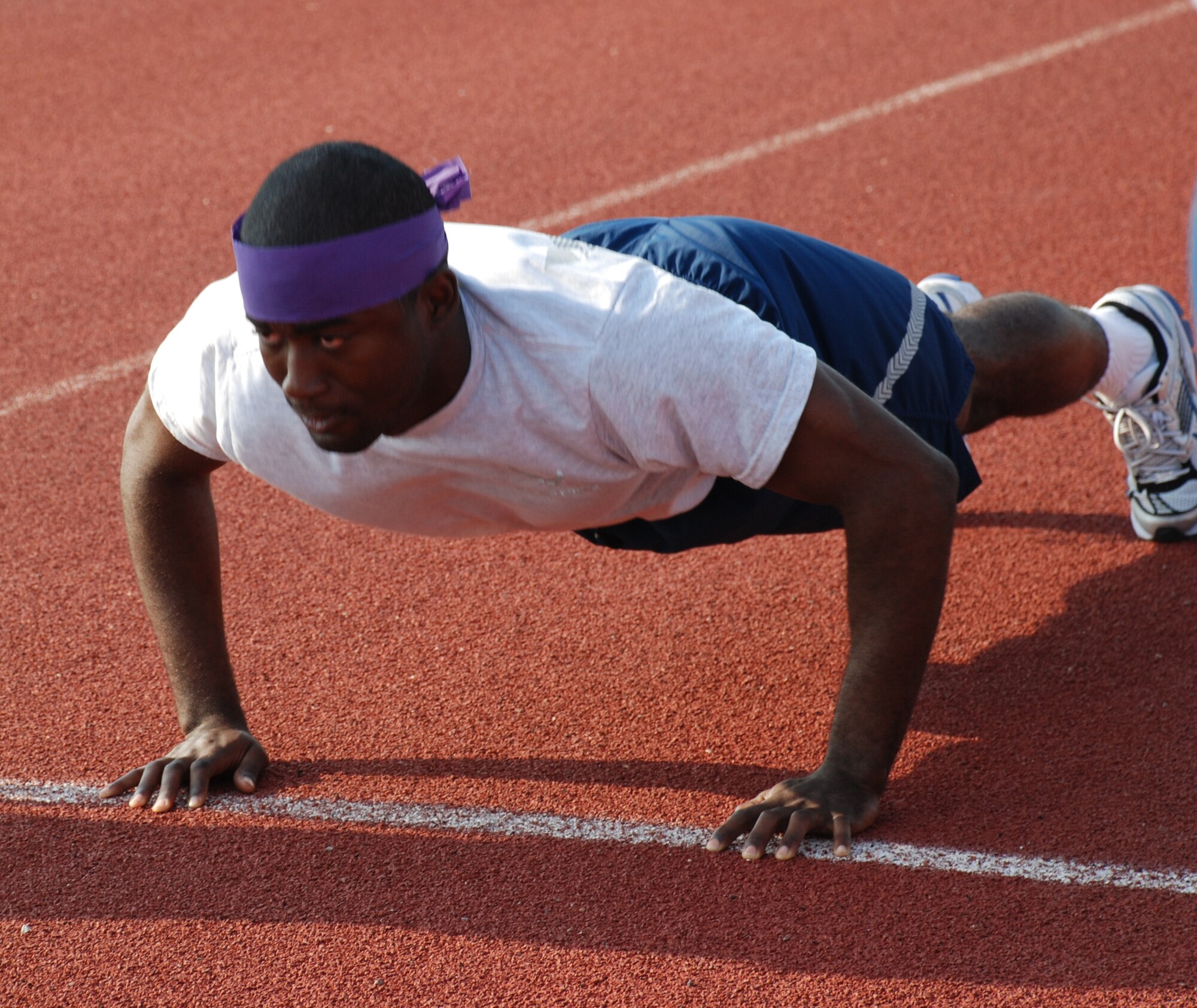 Airman 1st Class Nathan Romesburg from the 366th Training Squadron competes in the rucksack relay at the 2008 Joint Warrior Challenge May 24. The Joint Warrior Challenge was a series of competitions in observation of Armed Forces Day and Memorial Day. (U.S. Air Force photo/Airman 1st Class Candy Miller)