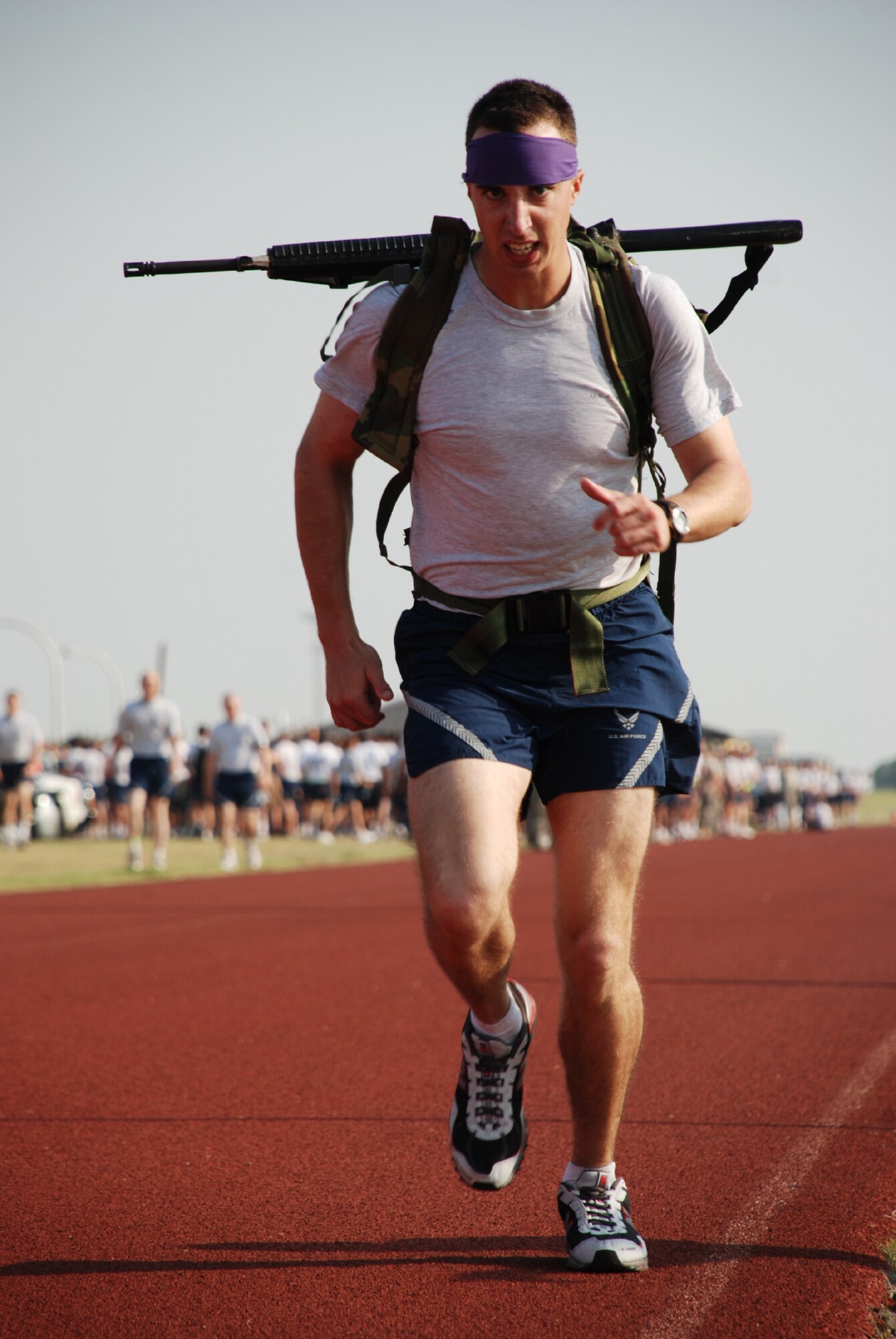 Airman 1st Class Benjamin Douglas from the 366th Training Squadron competes in the rucksack relay at the 2008 Joint Warrior Challenge May 24. The Joint Warrior Challenge was a series of competitions in observation of Armed Forces Day and Memorial Day. (U.S. Air Force photo/Airman 1st Class Candy Miller)