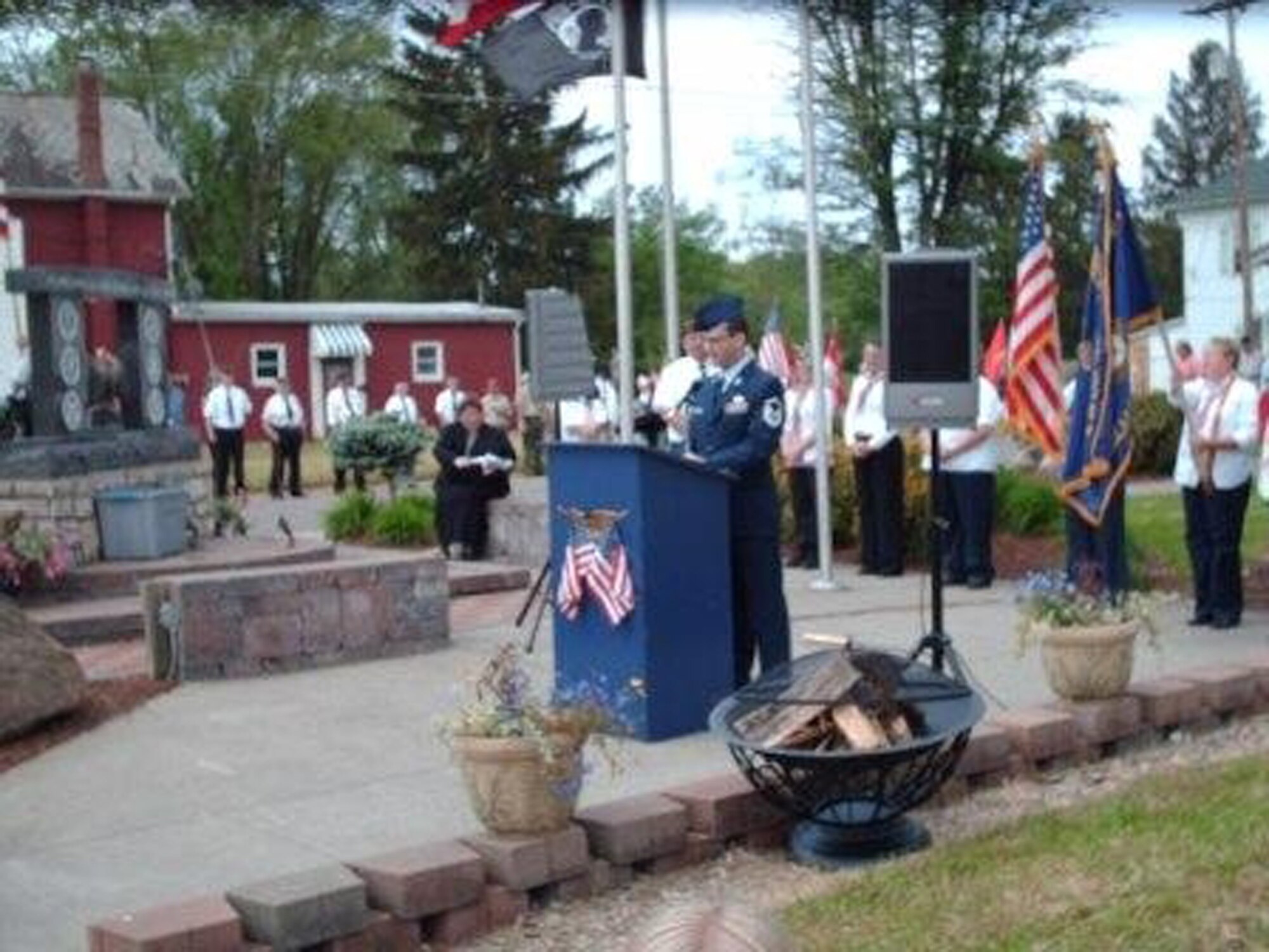 ROSEVILLE Ohio - Master Sgt. Anthony Johns, 445th Maintenance Squadron, speaks to the Roseville, Ohio community during the local Memorial Day Ceremony May 26, 2008.  Sergeant Johns' speech honored the memories of every Soldier, Sailor, Marine, Coast Guardsmen, and Airmen as well as Roseville veterans. (Courtesy photo)