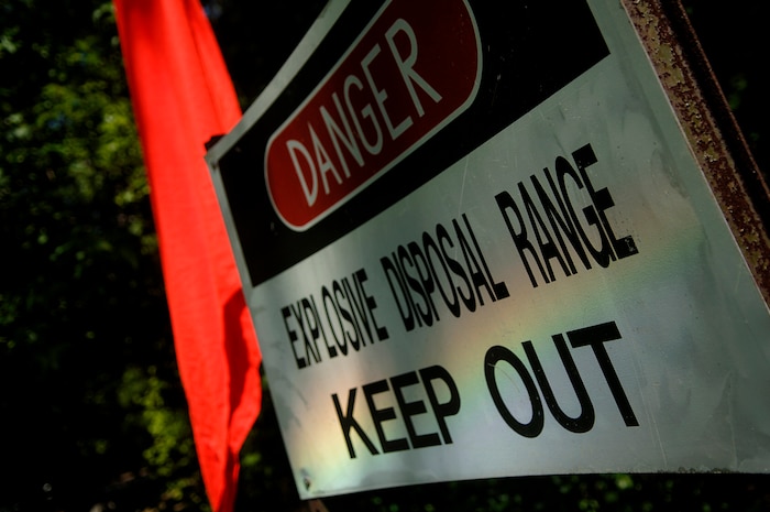 A sign warns members on Charleston AFB outside of a secure area on Charleston AFB where Airmen use C-4 to detonate sticks of TNT.  (U.S. Air Force photo/Senior Airman Nicholas Pilch)