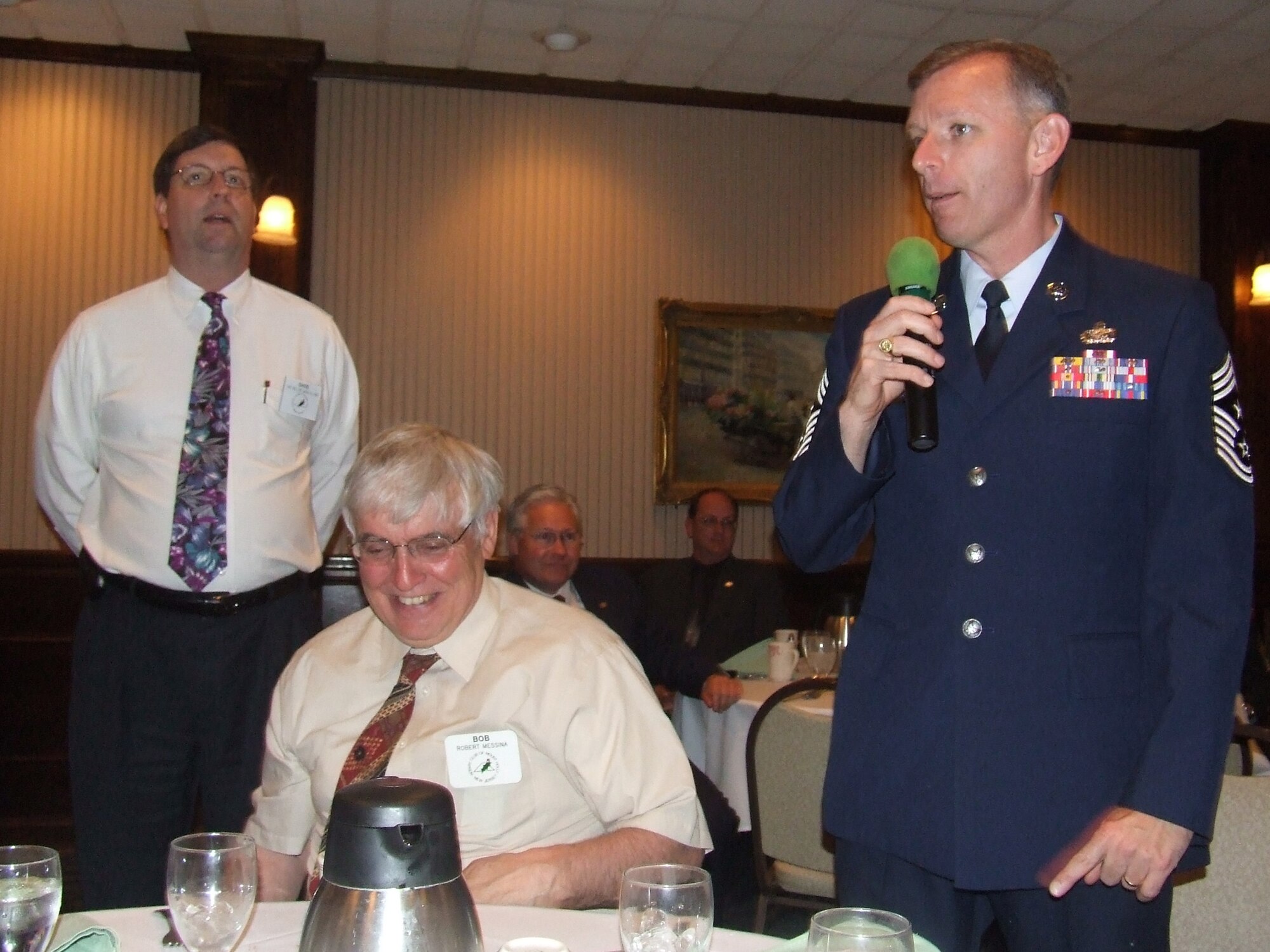 Chief Master Sgt. Jeffry Helm, U.S. Air Force Expeditionary Center command chief on Fort Dix, N.J., introduces himself to the Mount Holly, N.J., Rotary Club during a luncheon by the Rotary Club May 28, 2008, in Mount Holly.  Airmen from the USAF EC and Soldiers from Fort Dix were guests of honor as part of the Club's annual observance honoring the military.  (U.S. Air Force Photo/Tech. Sgt. Scott T. Sturkol)