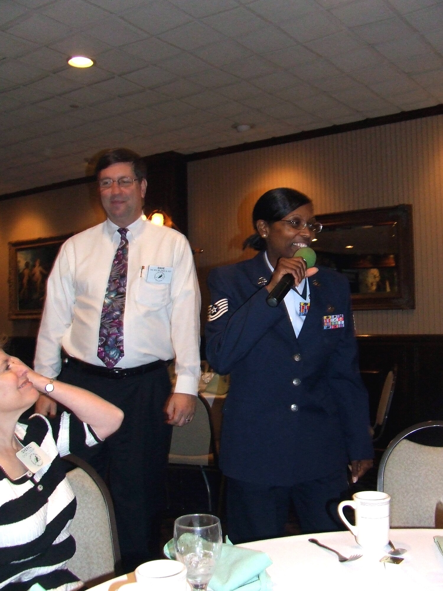 Tech. Sgt. Rekishia Beans, from the U.S. Air Force Expeditionary Center's Resources Directorate on Fort Dix, N.J., introduces herself to the Mount Holly, N.J., Rotary Club during a luncheon by the Rotary Club May 28, 2008, in Mount Holly.  Airmen from the USAF EC and Soldiers from Fort Dix were guests of honor as part of the Club's annual observance honoring the military.  (U.S. Air Force Photo/Tech. Sgt. Scott T. Sturkol)
