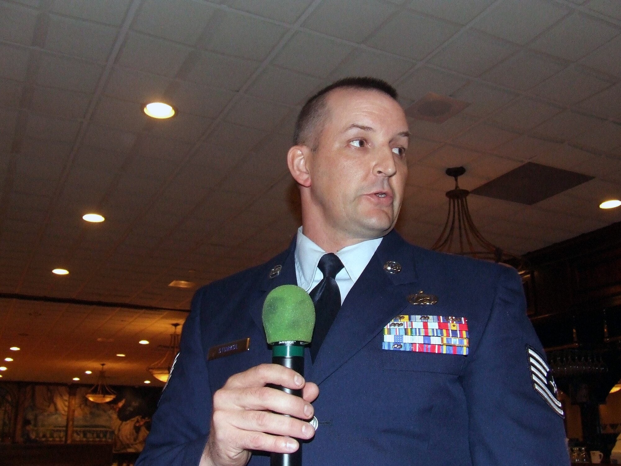 Tech. Sgt. Scott Sturkol, from the U.S. Air Force Expeditionary Center's Public Affairs Office on Fort Dix, N.J., introduces himself to the Mount Holly, N.J., Rotary Club during a luncheon by the Rotary Club May 28, 2008, in Mount Holly.  Airmen from the USAF EC and Soldiers from Fort Dix were guests of honor as part of the Club's annual observance honoring the military.  (U.S. Air Force Photo/Bobbi Sturkol)