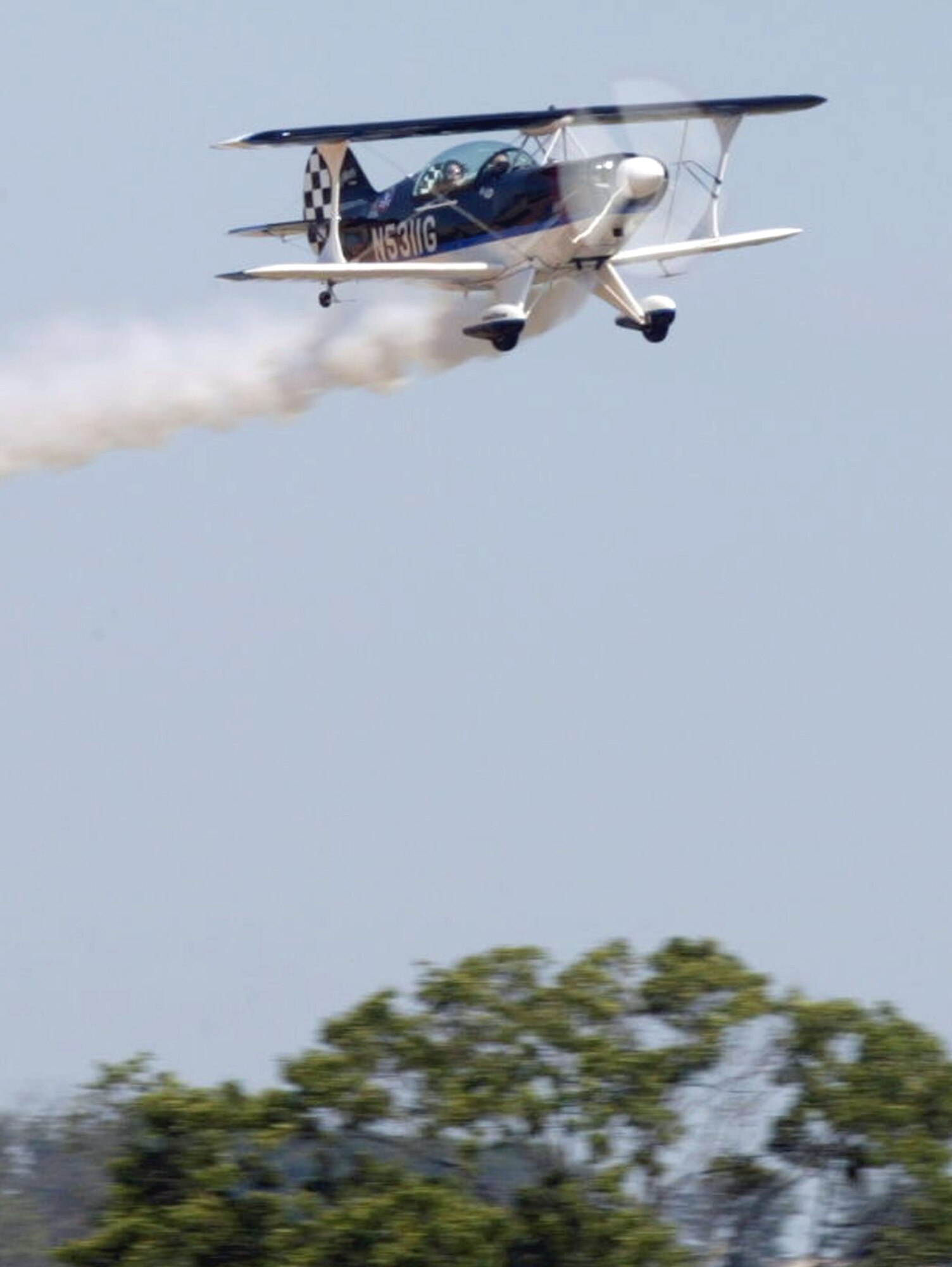 Lieutenant Colonel Jill 'Raggz' Long of Ragged Edge Aviation flies a Marietta reporter inside the cockpit of her Pitts S2B bi-plane May 20. Colonel Long is scheduled to perform during the Wings Over Marietta air show at Dobbins Air Reserve Base Oct. 18-19.