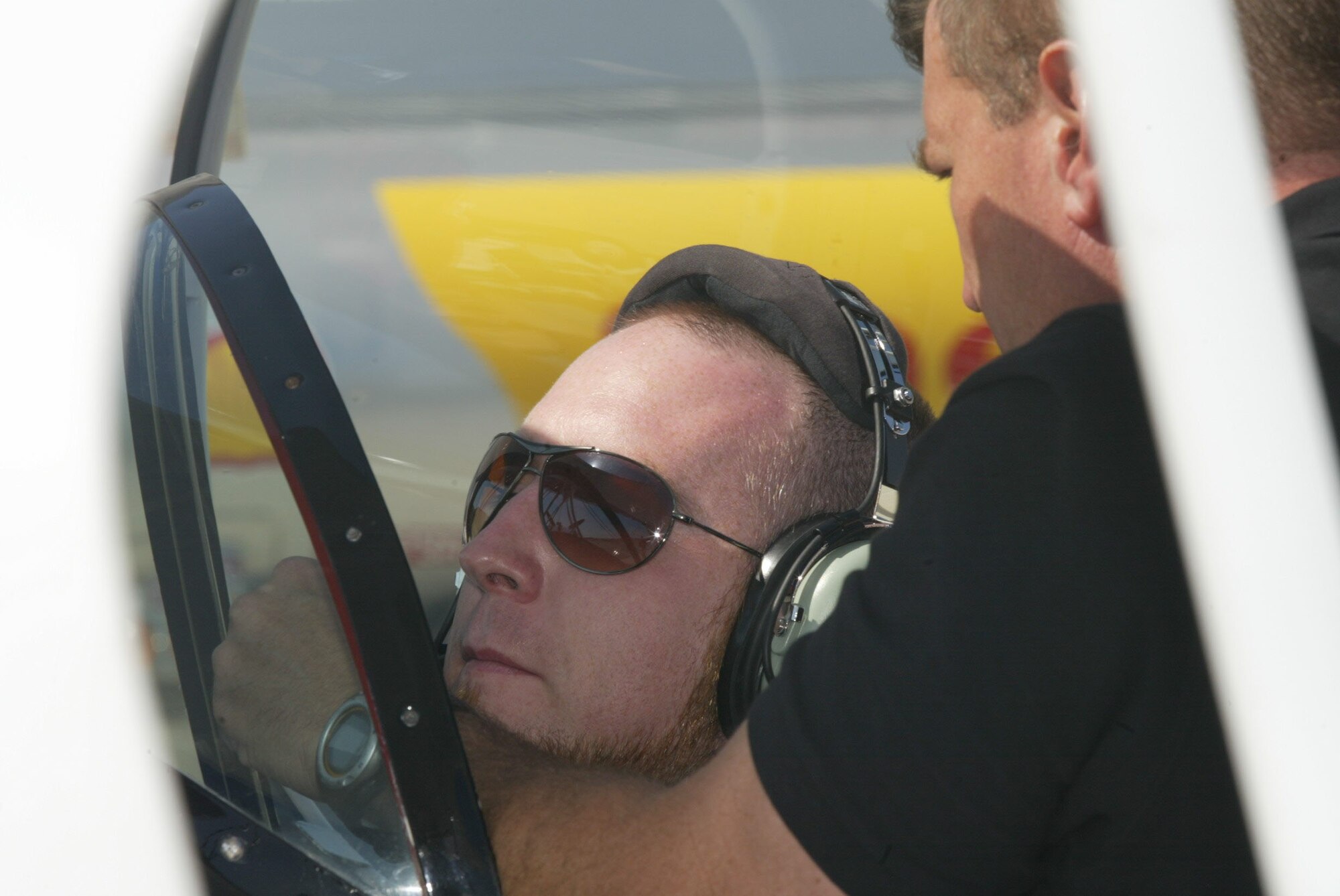 A reporter from the Marietta Daily Journal is strapped into the cockpit of a Pitts S2B bi-plane before a 20-minute flight May 20. Reporters got a chance to aim high during two media rides at McCollum Airport. The rides are a preview of what's to come during  the Wings Over Marietta air show Oct. 18-19 at Dobbins Air Reserve Base.