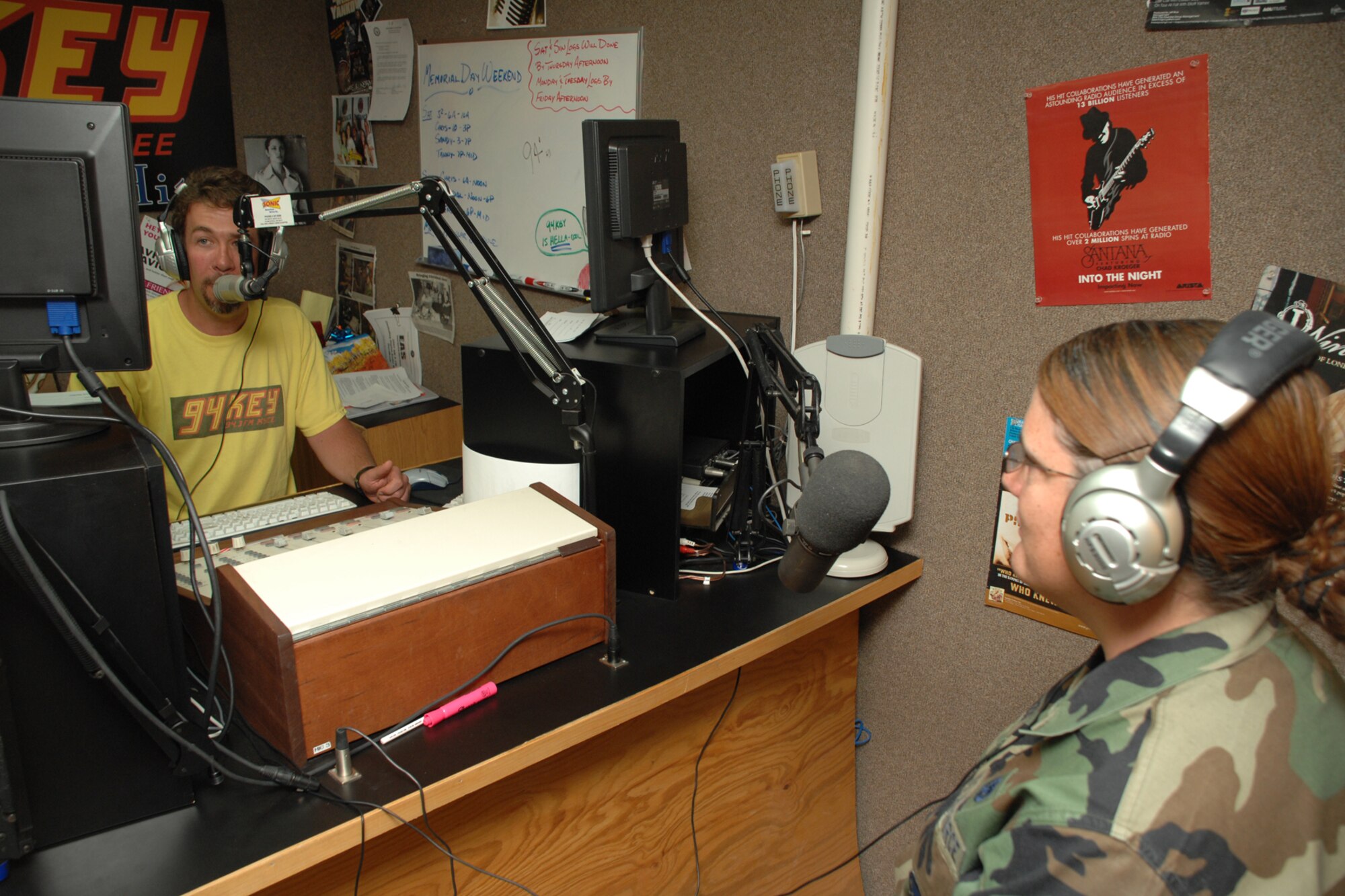 James "Double J" White, Burt Broadcasting operations manager and 94 Key DJ and Airman 1st Class Johanna Schwenzig, 49th Maintenance Squadron, braodcasts on 94 Key, KYEE FM 94.3, May 20 in Alamogordo, N.M. Airman Schwenzig spoke about her job and what she does on Holloman Air Force Base, N.M. (U.S. Air Force photo/Airman 1st Class Jamal D. Sutter)
