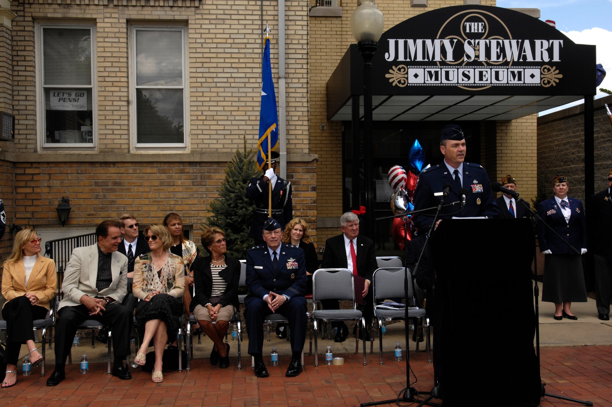 Col. Terry L. Ross, 11th Wing vice commander, speaks to an Indiana, Penn., crowd during a Jimmy Stewart Centenniel Celebration May 24. The famed actor flew bombing missions in World War II and became a brigadier general in the Air Force Reserve. (U.S. Air Force photo by Senior Airman Dan DeCook)