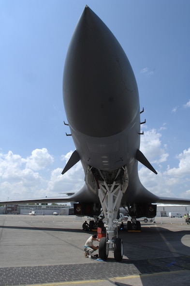 BERLIN, Germany - U.S. Air Force Senior Airman Marcus Smith cleans the nose landing gear of a B-1B Lancer bomber aircraft of the 7th Bomb Wing at Dyess Air Force Base, Texas in preparation for the 2008 Berlin Air Show here May 24. Airman Smith is an aircraft maintenance crew chief of the 7th Aircraft Maintenance Squadron, 7th BW, on temporary duty for the first time away from his home station.  (U.S. Air Force photo by Tech. Sgt. Corey Clements)
