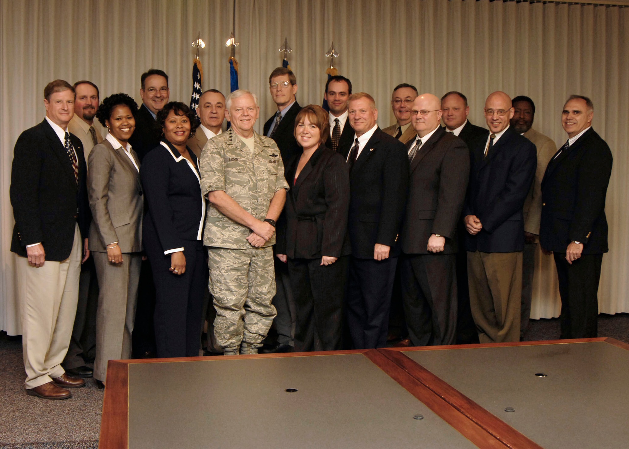 SCOTT AIR FORCE BASE, Ill. --Civilian Leadership Development Program participants were honored by Gen. Arthur J. Lichte during a ceremony May 21 for their work with the program. Pictured from left to right is (front row) Dan Schultz, Brigitt Harris, Gail Collymore, General Lichte, Shelly Lankford, John Macke, John Haupt, Scott Haller, Ken Lentz (second row) Greg Conrad, Robert Dodge, Jim Domina, Rick Morris, Mark Thompson, Steve Dugger, Jonathan Gunn and Greg Williams. The program was approved March 30 for high potential GS-11-12, WG-10-14, WL-9-10 and NSPS equivalents at Scott Air Force Base to broaden participants' knowledge of the Air Mobility Command mission, structure and business activities of key organizations and improve their management and leadership skills through workshops and projects. Because of the program's success, organizers are already preparing for CLDP-02, scheduled to start in June. (U.S. Air Force photo/Senior Airman Mildred Guevara)