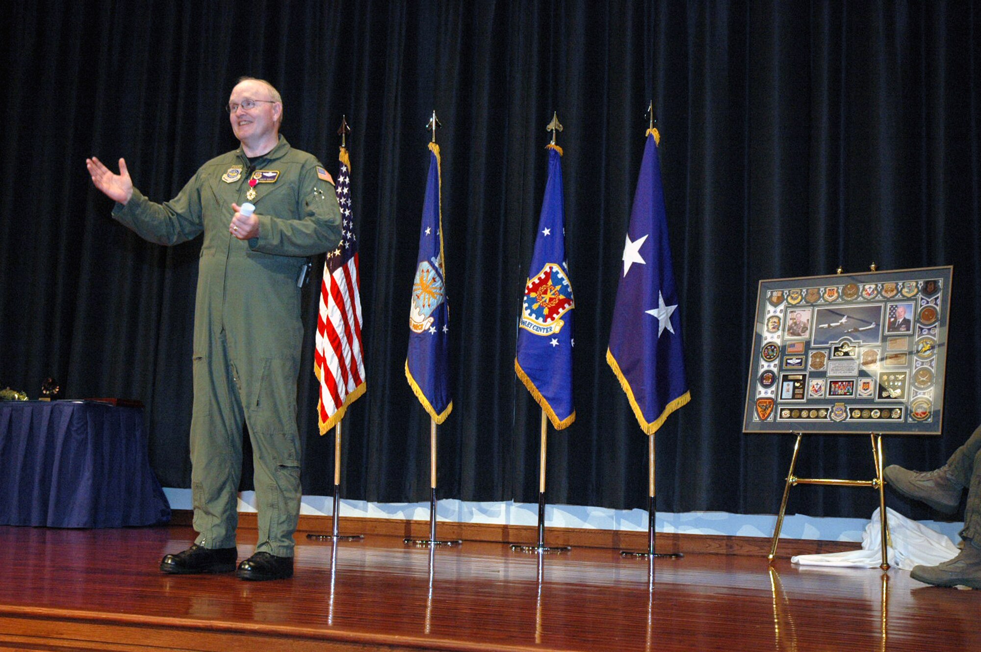 Col. Tracy Scott addresses the audience during his retirement ceremony in the U.S. Air Force Expeditionary Center's Grace Peterson Hall May 16, 2008, on Fort Dix, N.J.  Maj. Gen. John Howlett, mobilization assistant to the commander of Air Mobility Command, Scott Air Force Base, Ill., was the presiding officer over the ceremony for Colonel Scott, mobilization assistant to the commander of the USAF EC, who retired after 30 years of service.  (U.S. Air Force Photo/Tech. Sgt. Scott T. Sturkol)