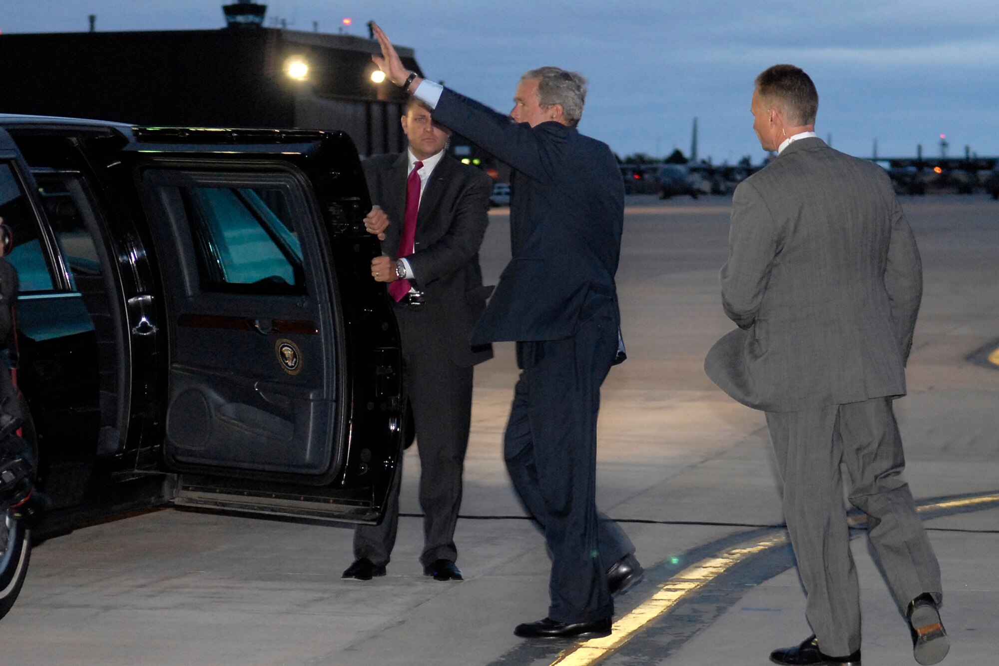 President George W. Bush waves to onlookers as he heads to his vehicle after arriving at Peterson Air Force Base May 27. The president came to Colorado Springs to speak at the 50th Air Force Academy Graduation May 28. (U.S. Air Force photo by Mr. Rob Bussard)