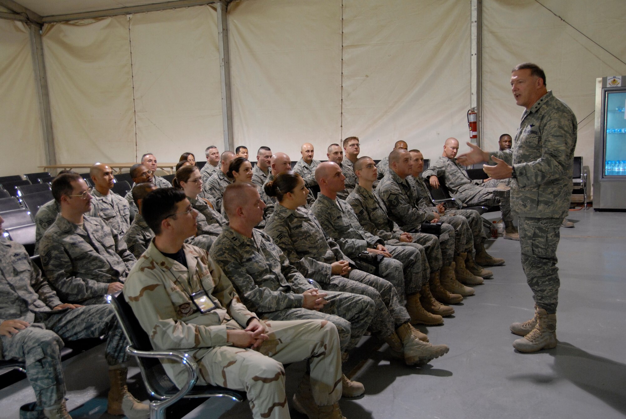 SOUTHWEST ASIA -- Lieutenant Gen. Gary North, the Ninth Air Force and Combined Forces Air Component Commander for U.S. Central Command, speaks with Airmen from the 387th Air Expeditionary Group at the passenger terminal during an all call May 25, 2008 on an air base in the Persian Gulf Region. General North wrapped up a nine-day tour throughout the U.S. Air Forces Central area of responsibility to welcome recently deployed Airmen. He spoke with Airmen about the different mission sets they perform and to the level of proficiency and consistency at which Airmen execute those mission sets. (U.S. Air Force photo/ Staff Sgt. Patrick Dixon)