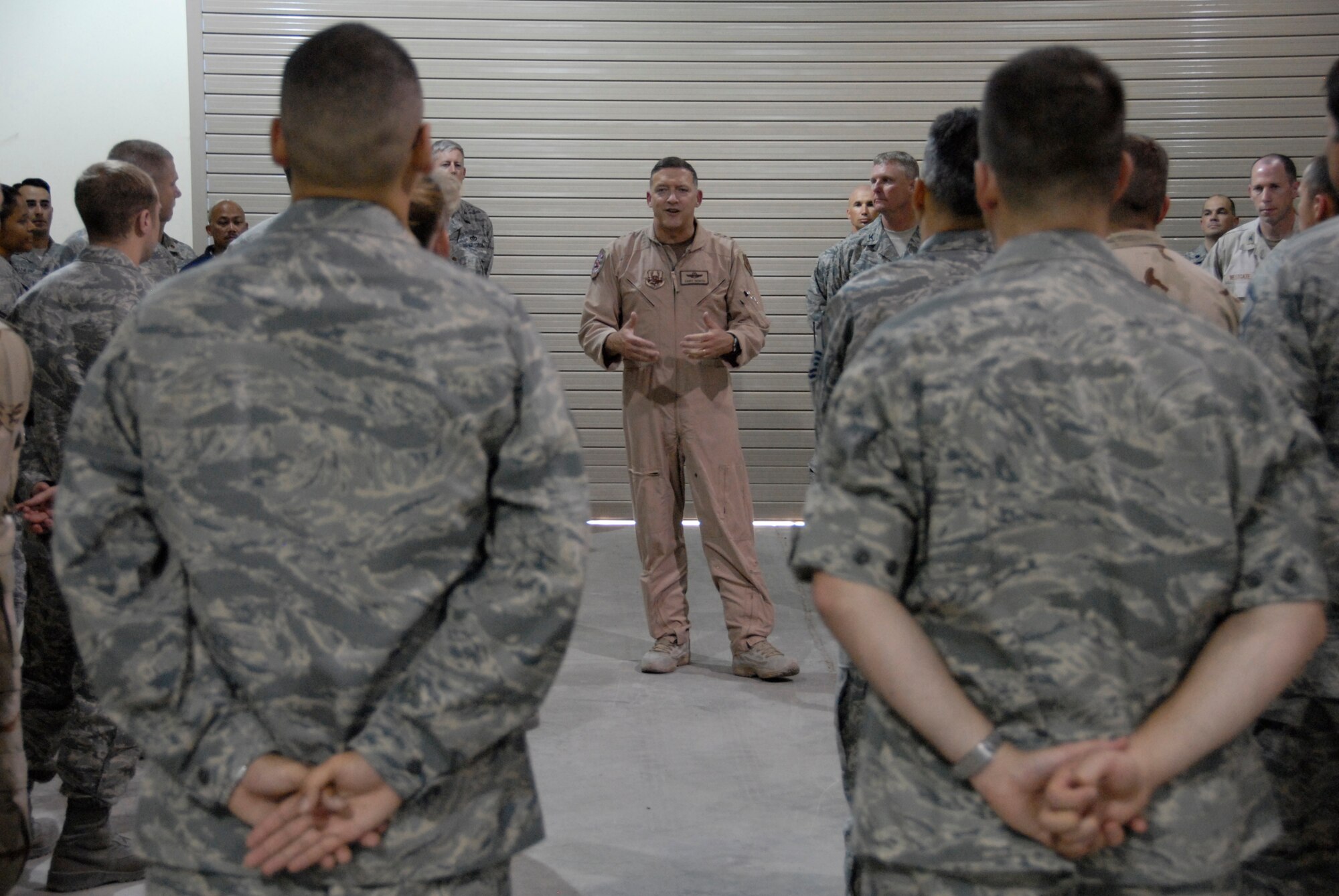 SOUTHWEST ASIA -- Lieutenant Gen. Gary North, the Ninth Air Force and Combined Forces Air Component Commander for U.S. Central Command, speaks to Airmen from the 386th Expeditionary Maintenance Group May 24, 2008 on an air base in the Persian Gulf Region. General North wrapped up a nine-day tour throughout the U.S. Air Forces Central area of responsibility to welcome recently deployed Airmen. He spoke with Airmen about the different mission sets they perform and to the level of proficiency and consistency at which Airmen execute those mission sets.  (U.S. Air Force photo/ Staff Sgt. Patrick Dixon)