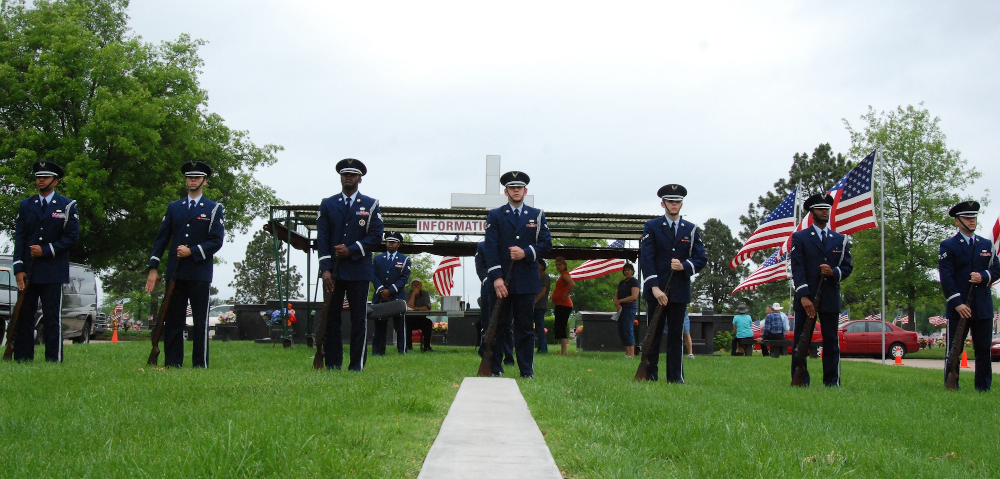 Wichita, Kan. -- McConnell Air Force Base Honor Guard members perform a rifle sequence more commonly known as the seven-gun, three volley salute at the 50th annual Memorial Day observance at Resthaven mortuary and cemetery in Wichita, May 26. (Photo by Airman 1st Class Jessica Lockoski)