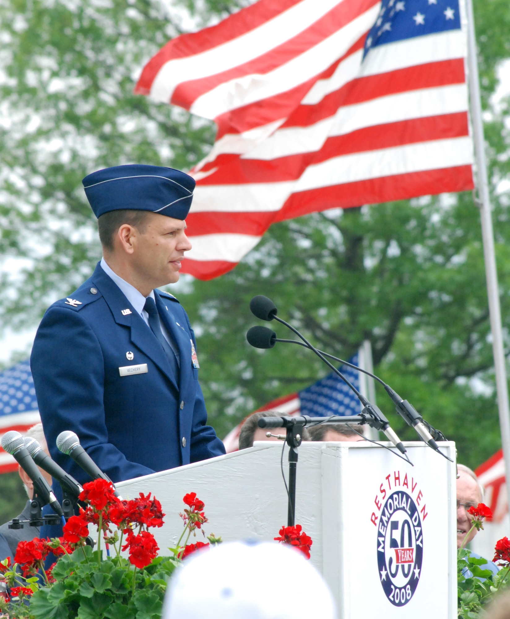 Wichita, Kan. -- Col. James C. Vechery, 22nd Air Refueling Wing commander, speaks to Memorial Day members about taking time to remember fallen servicemembers and their families on Memorial Day, May 26 at the Resthaven mortuary and cemetery, Wichita.  (Photo by Airman 1st Class Jessica Lockoski)