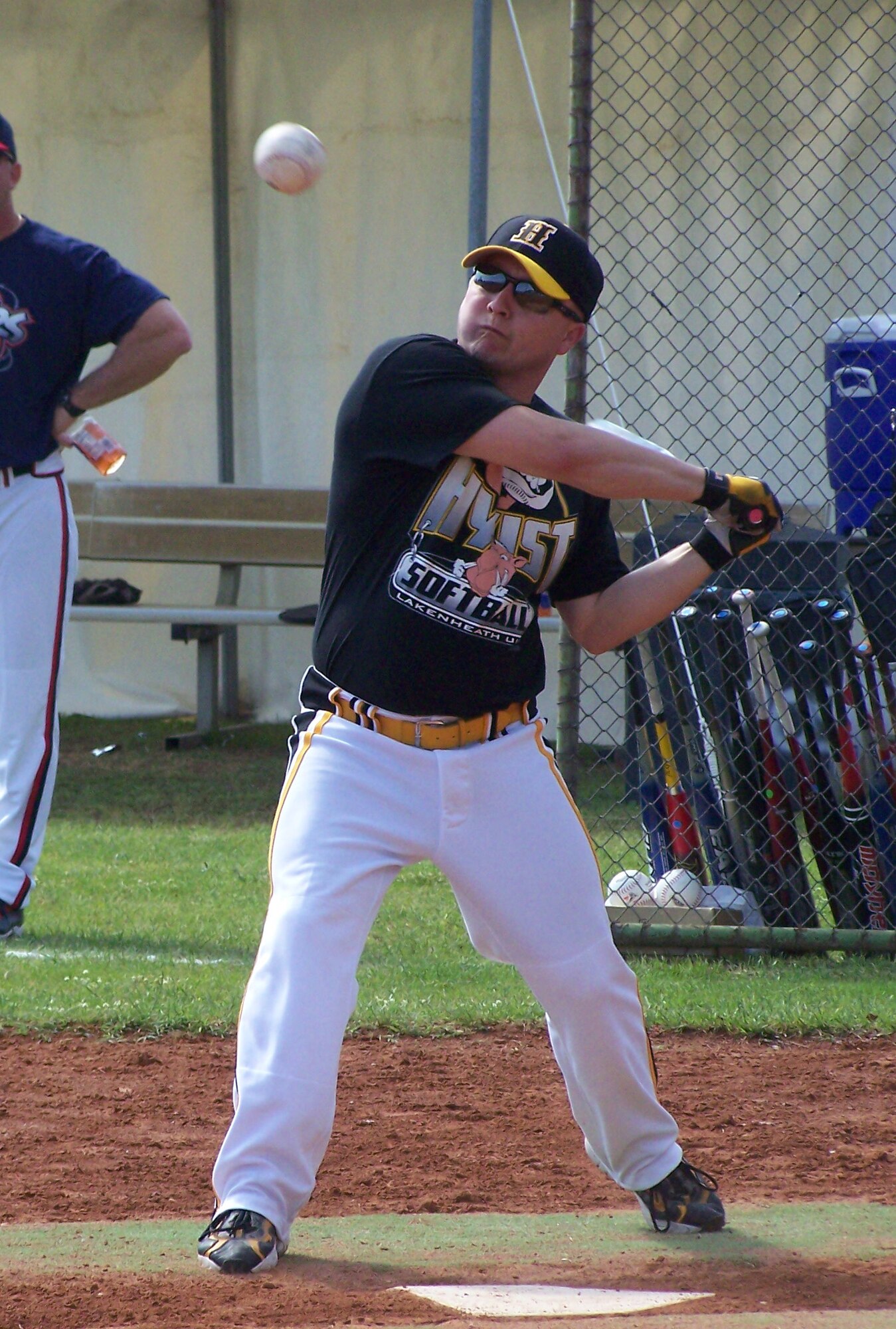 William Richards, an outfielder for Lakenheath Men's Varsity Softball team, eyes a pitch during a game against the Spangdahlem Sabers May 24 at Camp Darby, Italy. The Lakenheath team beat the Sabers during Camp Darby's European Open Softball tournament. The men’s team took fifth place and the Lakenheath Women's Varsity team took fourth place in the tournament. (U.S. Air Force photo by Staff Sgt. Vanessa Young)