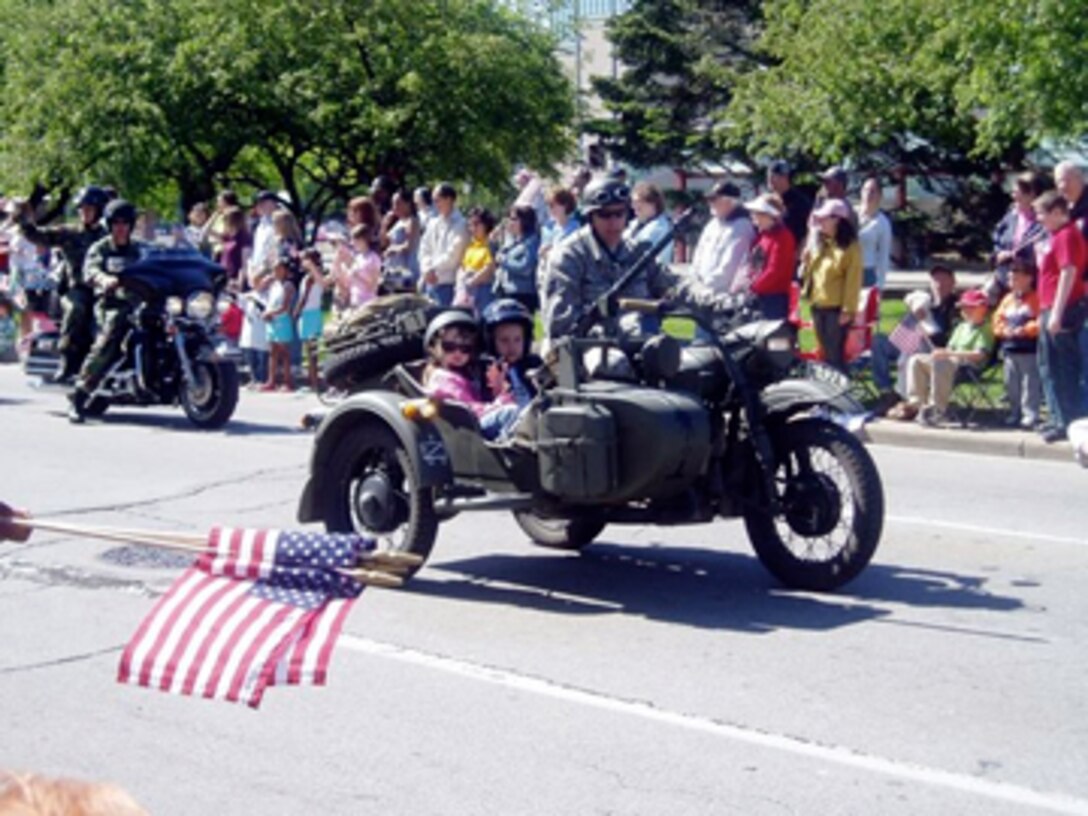 TSgt Tim McCormick, Security Forces, from the 180th Fighter Wing, rides in the annual Memorial Day Parade in Toledo, Ohio. Photo by Christi S. Bartman