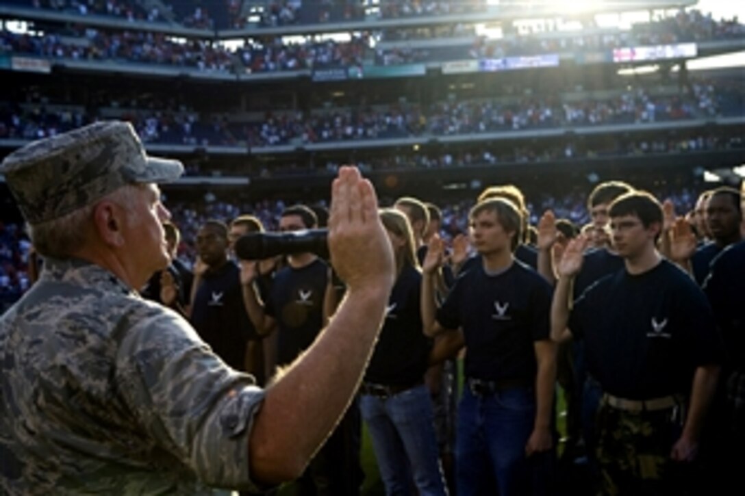 U.S. Air Force Gen. Arthur J. Lichte enlists 170 new Air Force recruits during pre-game activities at the Philadelphia Phillies - Colorado Rockies game, May 26, 2008. Activities at the game were held in conjunction with Air Force Week-Philadelphia. Lichte is commander of the Air Mobility Command.