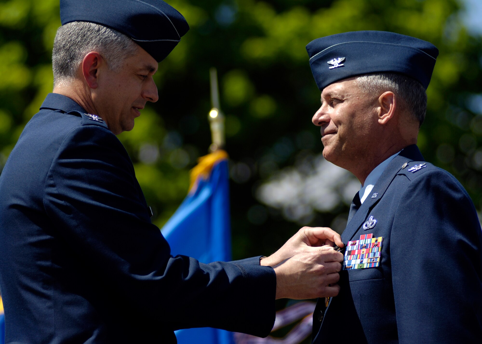 FAIRCHILD AIR FORCE BASE, Wash. – Col. Roger Watkins, 92nd Air Refueling Wing vice commander, presents  outgoing 92nd Mission Support Group commander Col. Van Fuller with the Legion of Merit medal during the MSG change-of-command ceremony here May 27. (U.S. Air Force photo / Staff Sgt.  Chad Watkins)