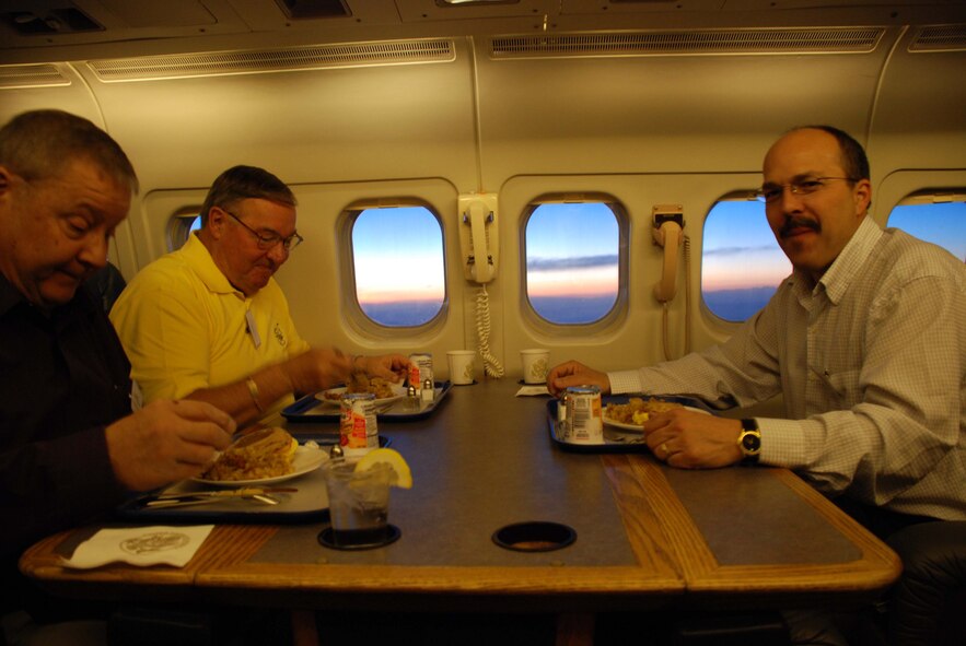 Civic leaders enjoyed a meal served by 932nd Airlift Wing flight attendants during a recent civic leader tour in conjunction with Fourth Air Force.  Thirty-nine civic leaders visited, including mayors, primarily from Southern California, the Chicago region and a few communities surrounding Scott Air Force Base. The event was designed to help educate and inform the public about the mission.   Photo/Tech Sgt. Gerald Sonnenberg
