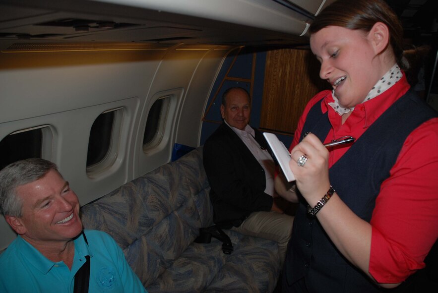 Civic leaders took time out of their lives learning about the 932nd Airlift Wing as flight attendants took their orders for a recent breakfast aboard the C9-C plane.  These tours are designed to help educate and inform. Thirty-nine civic leaders visited, including mayors, primarily from Southern California, the Chicago region and a few communities surrounding Scott Air Force Base. The event was designed to help educate and inform the public about the mission.   The wing continues to hire flight attendants for the Air Force Reserve Command.  Photo/Tech Sgt. Gerald Sonnenberg