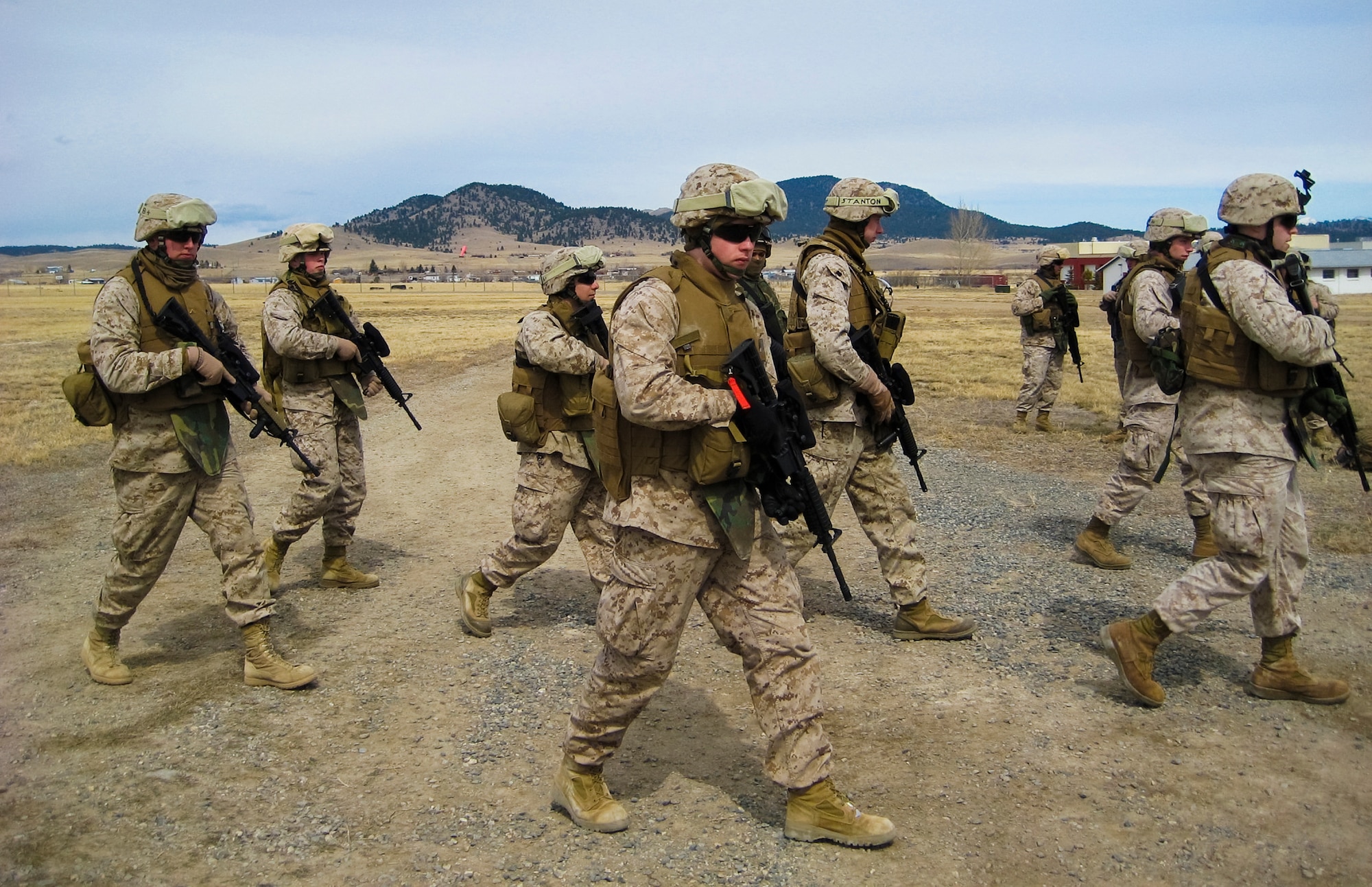 Members of the Anti-Terrorism Battalion on personal security detail practice ?protecting a principal? in a hostile environment during annual training. One of the specialized capabilities of the battalion, this mission involves providing personal protection for dignitaries or senior military or civilian officials. (Photo courtesy of Delta Company Anti-Terrorism Battalion)