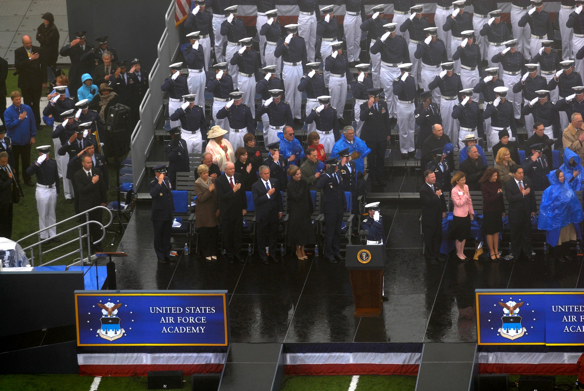 Everyone at the U.S. Air Force Academy's Falcon Stadium, including President George W. Bush, Secretary of the Air Force Michael Wynne and Air Force Chief of Staff Gen. T. Michael Moseley, pledge allegiance to the flag during the Academy Class of 2008 graduation ceremony May 28.  (U.S. Air Force photo/David Armer)