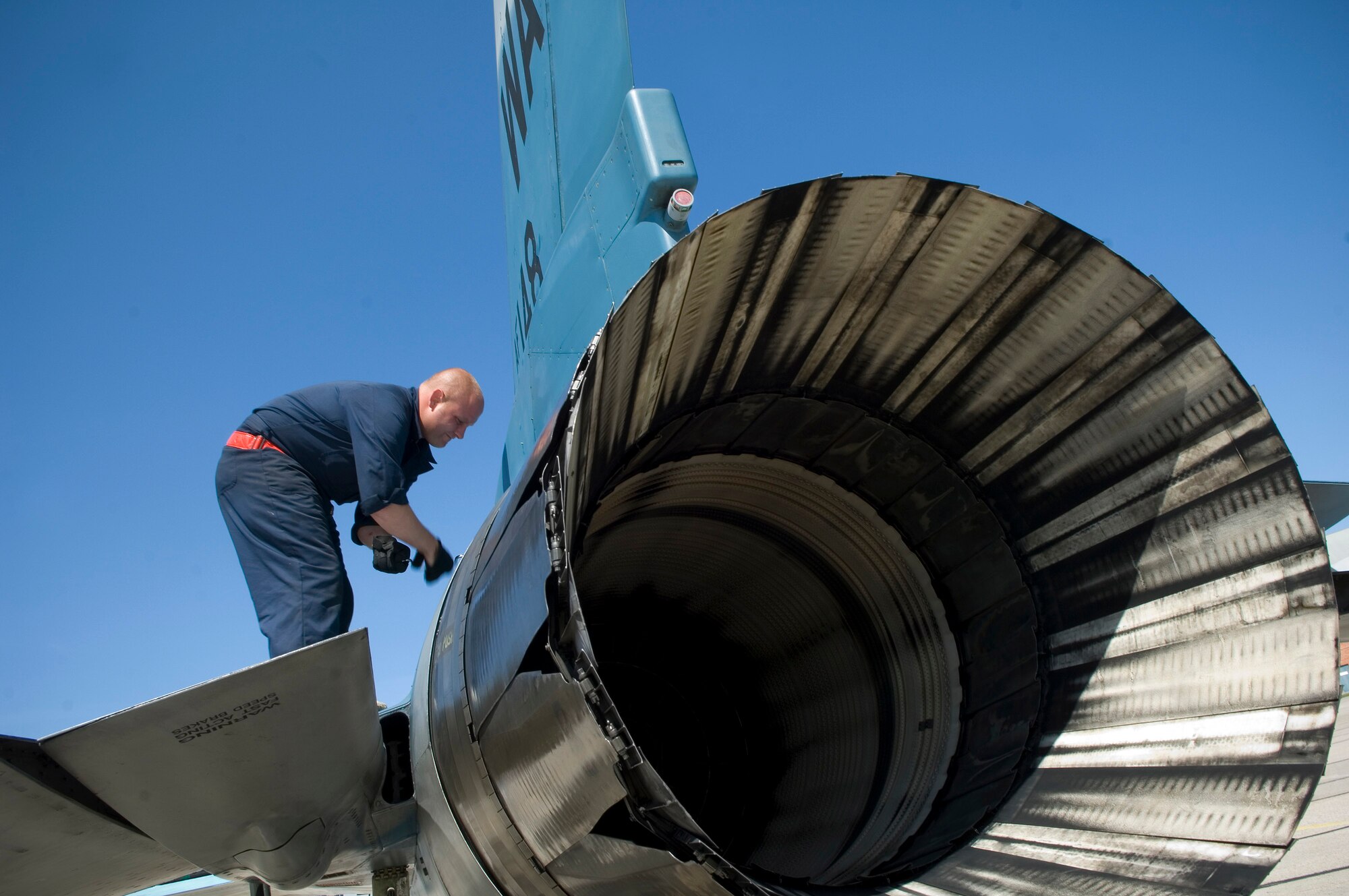 Staff Sgt. John Linfoot performs a post flight inspection on a F-16 Fighting Falcon  during Maple Flag 41 at Cold Lake, Canada. Sergeant Linfoot is crew chief from the 64th Aggressor Squadron, Nellis Air Force Base, Nev. Maple Flag is a four-week international air combat exercise held annually at 4 Wing Cold Lake, Alberta. The exercise provides Canadian and allied aircrews with realistic training in a modern simulated air combat environment, and it emphasizes air operations, involving large package coalition forces. Sergeant Linfoot is an F-16 jet crew chief. (U.S. Air Force photo/Master Sgt. Cecilio Ricardo) 
