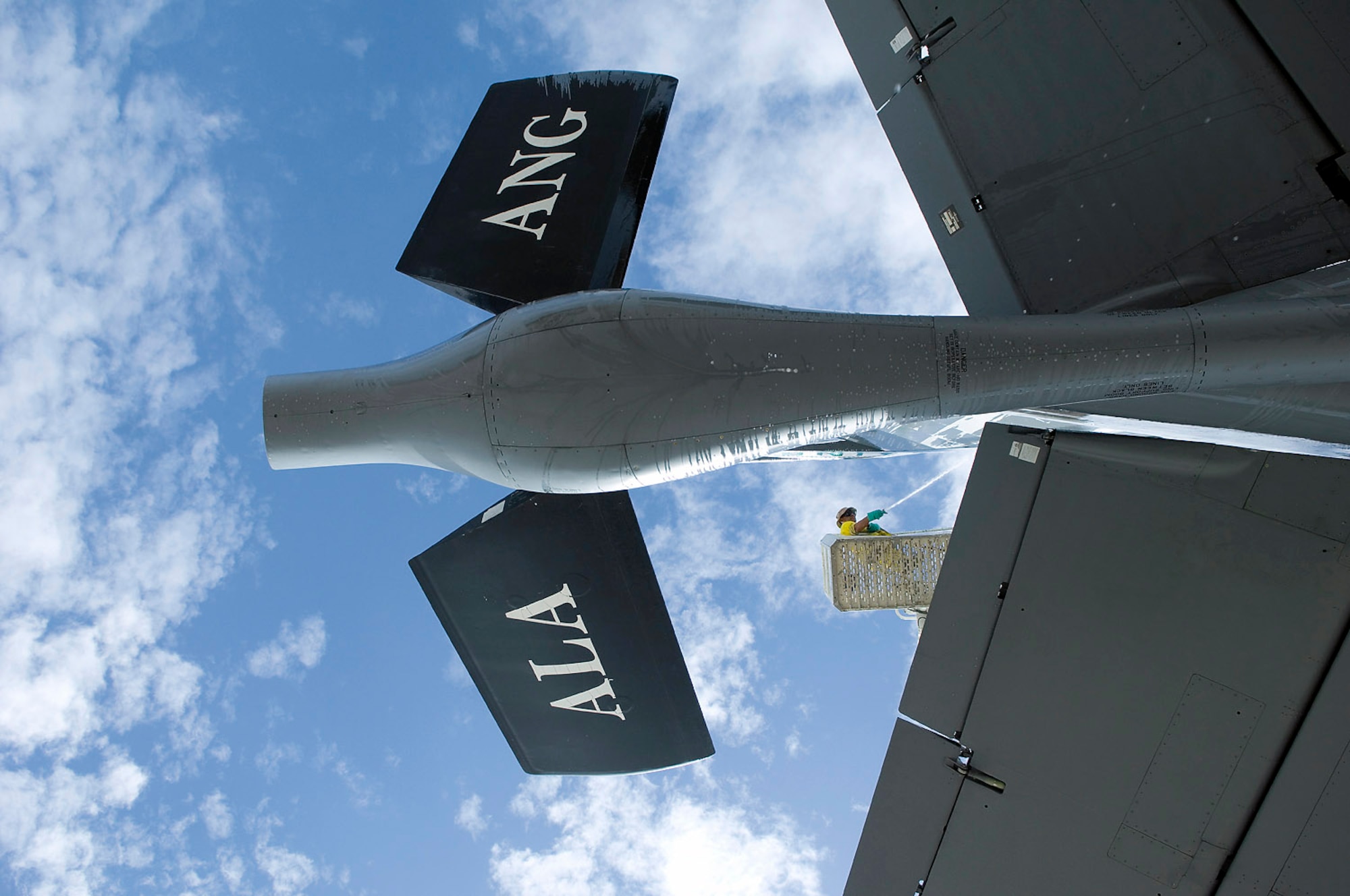 Lawrence Aldrete prepares a KC-135E Stratotanker for storage and preservation at the Aerospace Maintenance and Regeneration Group storage site at Davis-Monthan Air Force Base, Ariz. AMARG's mission has evolved beyond merely the storage and preservation of aircraft.  Today the center provides customer services including aircraft regeneration which means restoring aircraft to flying status, limited depot-level maintenance, parts reclamation, historic storage and disposal functions.  (U.S. Air Force photo/Bennie J. Davis III)