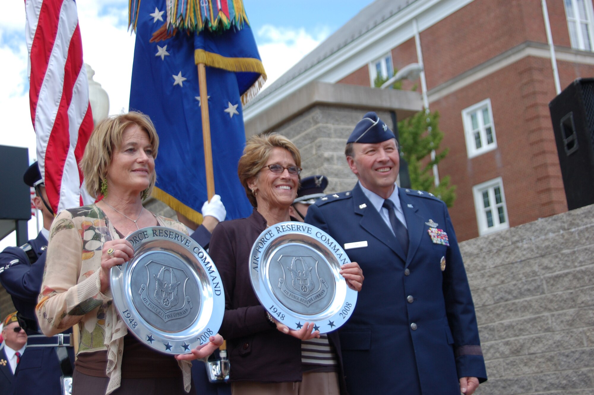 Maj. Gen. Charles E. Stenner Jr., assistant deputy chief of staff for Strategic Plans and Programs, Headquarters U.S. Air Force, represented the Air Force Reserve Command during a ceremony in Indiana, Pa., honoring former reservist and Hollywood actor James Stewart. He presented Kelly Stewart Harcourt and Judy Stewart, the actor’s daughters , with two pewter plaques commemorating the Air Force Reserve’s 60th anniversary.  He also gave them a photograph of their father sitting at his desk when he served as deputy director of the Office of Information Services, the predecessor to Secretary of the Air Force Public Affairs. (U.S. Air Force photo/Lt Col Lori Largen) 