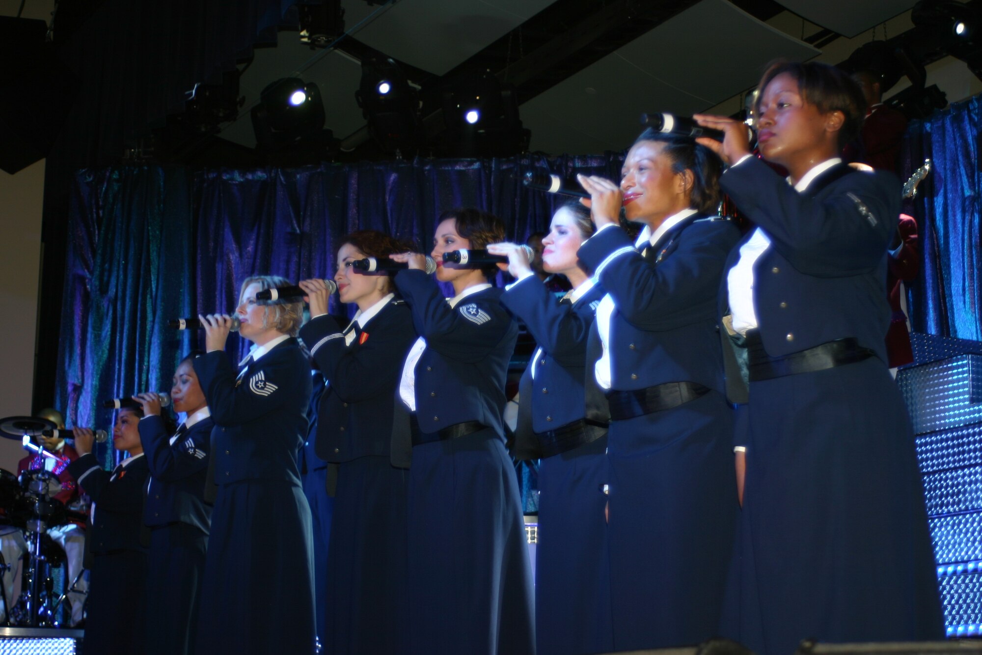 Tops in Blue members perform songs from their “Deja Blue” show at the North Hanover Upper Elementary School May 28 as part of Air Force Week in Philadelphia. Events for Air Force Week in Philadelphia will continue through June 2. The 2008 McGuire Air Expo will conclude the week’s events, May 31 and June 1 here. (U.S. Air Force photo/Senior Airman Danielle Johnson) 