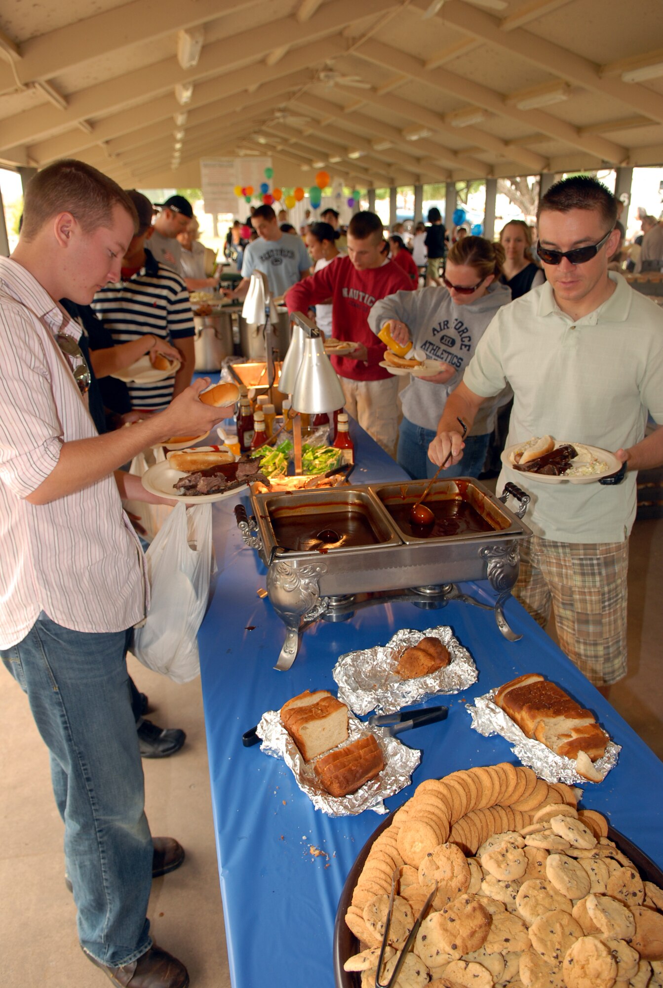 The City of San Angelo treated Team Goodfellow to the third annual “Goodfellow Appreciation Picnic” on Armed Forces Day, May 17. In addition to a hearty barbecue meal, activities such as rock climbing and pony rides were available for the many families who attended. All told, more than 2,000 people attended the picnic. The picnic was sponsored by the San Angelo Chamber of Commerce Military Affairs Committee. (U.S. Air Force photo by Staff?Sgt. John Barton)