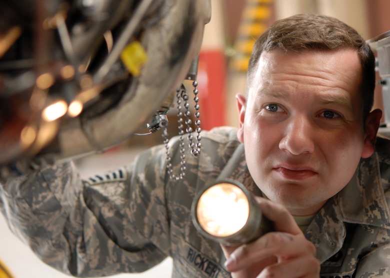TSgt. Andrew Rickert, 756th Maintenance Squadron, performs an inspection during his daily duties at Luke AFB. Besides being a mechanic, he has a talent for creating works of art through painting. (Courtesy Photo)