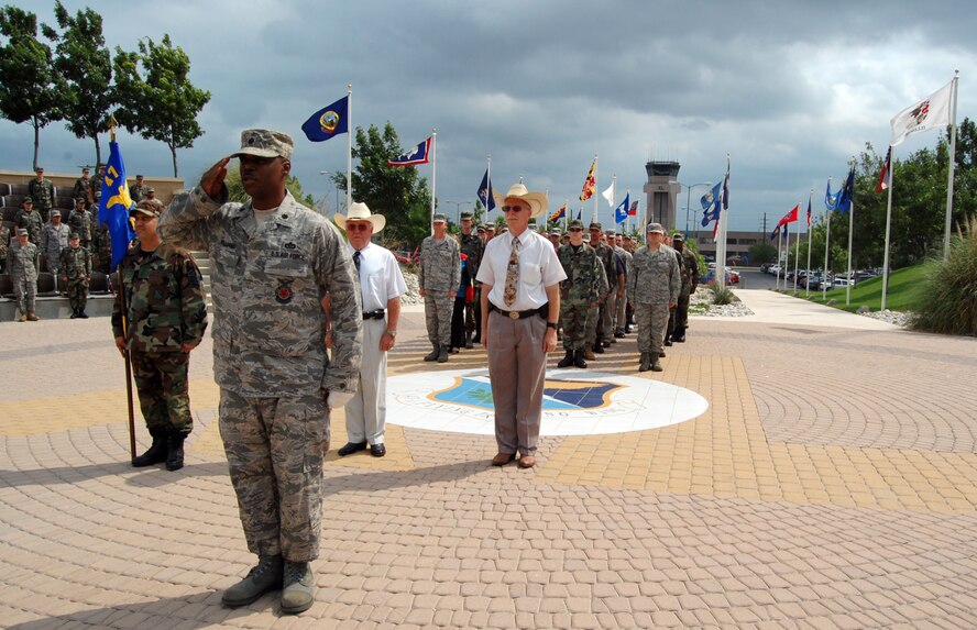 LAUGHLIN AIR FORCE BASE, Texas – Lt. Col. Garrick Williams, 47th Installation Support Squadron (Provisional) commander, stands in front of a formation for the new 47th ISS(P) at the 47th Civil Engineer Squadron and 47th Communications Squadron merger ceremony here May 27.