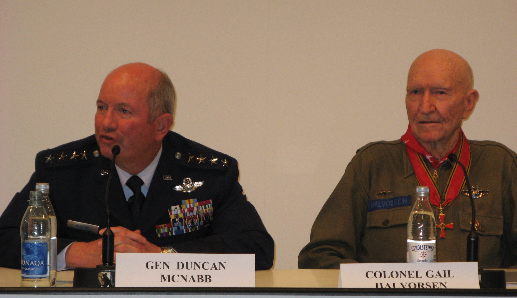 Gen. Duncan J. McNabb, Air Force vice chief of staff, and retired Col. Gail Halvorsen, the famed Berlin Airlift candy bomber, participate in a panel discussion in Berlin May 27 commemorating the 60th anniversary of the Berlin Airlift.  (U.S. Air Force photo/Lt. Col. Michael Downs)