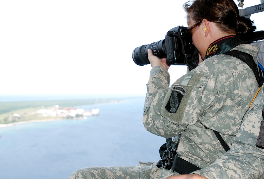 Sergeant Kathy Young of the 982d Combat Camera Company captures images of the Honduran coastline while on annual training in Honduras as part of a Beyond the Horizon exercise. Photo taken on May 03, 2008 as part of Beyond the Horizons. Beyond the Horizons is a training exercise between the United States and Honduras carried out to enhance strong relations to US partnerships in the Caribbean and the Americas while providing US Reserve Soldiers with valuable military training.  (Photo by First Lieutenant Ryan Hanna)(Released)