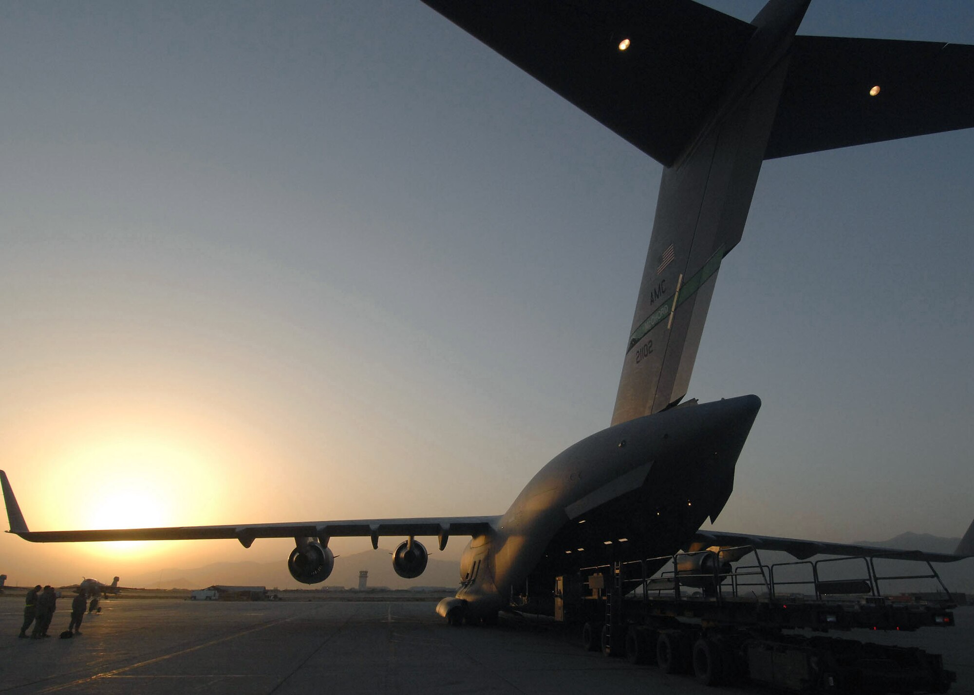 A C-17 Globemaster III is loaded, in preparation for airdrops in support of Operation Enduring Freedom.  The C-17 plays a key role in the delivery of supplies to forward operating bases that prevent convoys from reaching safely. (U.S. Air Force photo/Staff Sgt. Joshua T Jasper)   