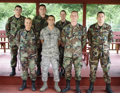 SEYMOUR JOHNSON AIR FORCE BASE, N.C. - (Front row, left to right) Staff Sgt. Janelle Morton, Airman 1st Class Matthew McClement, Airman 1st Class Brandon Dick, Airman 1st Class Justin Lewelling, (Back row, left to right) Airman 1st Class Tyler Brown, Airman 1st Class Jacob Mullins and Staff Sgt. Deanna Carter, all air traffic controllers for the 4th Operations Support Squadron, pose for a group photo here May 23. The Airmen volunteered their off-duty time, traveled 40 miles round trip per day over a three-day period and donated an average of four hours a day to assist the teachers at B.F. Grady Elementary School in Duplin County, N.C. as end-of-grade test proctors. (U.S. Air Force photo by Jerry Hatcher)