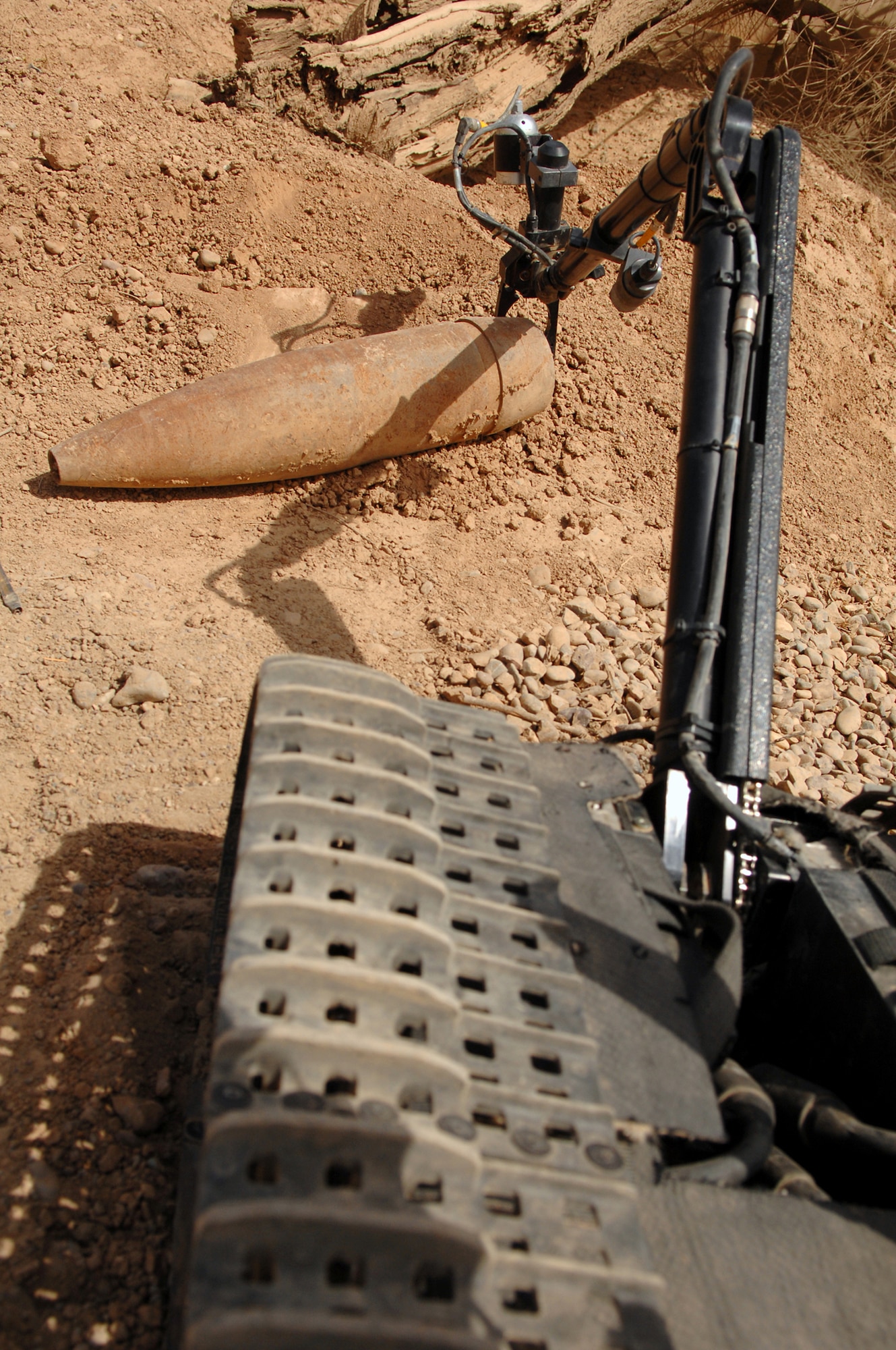BALAD AIR BASE, Iraq -- A Talon robot is operated by the 332nd Expeditionary Civil Engineer Squadron explosive ordnance disposal Airmen, here, May 26. The Talon robot is used to disarm and disrupt improvised explosive devices and unexploded ordnances. The distance between robot operators and the ordnances they seek to disarm helps keep EOD Airmen alive and safe. (U.S. Air Force photo/ Senior Airman Julianne Showalter)