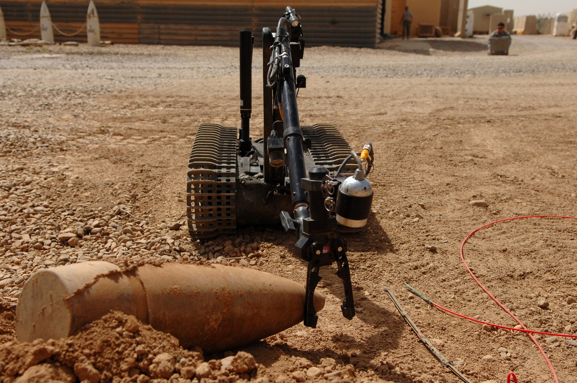 BALAD AIR BASE, Iraq -- A Talon robot is operated by the 332nd Expeditionary Civil Engineer Squadron explosive ordnance disposal Airmen, here, May 26. The Talon robot is used to disarm and disrupt improvised explosive devices and unexploded ordnances. The distance between robot operators and the ordnances they seek to disarm helps keep EOD Airmen alive and safe. (U.S. Air Force photo/ Senior Airman Julianne Showalter)