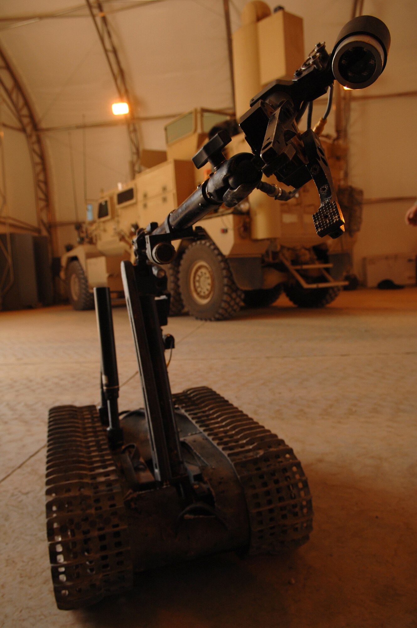 BALAD AIR BASE, Iraq -- A Talon robot is operated by Airmen assigned to the 332nd Expeditionary Civil Engineer Squadron explosive ordnance disposal flight here, May 26. The Airmen assigned to Balad AB practice operating the robot, which is used to disarm unexploded ordnances from up to 1,000 meters away from the operator, in order to be prepared when encountering and disabling real UXOs. EOD Airmen respond to UXO findings within the confines of Balad AB and also participate in convoy operations with U.S. Army Soldiers identifying and disabling roadside improvised explosive devices that endanger the lives of traveling coalition forces and Iraqi civilians. (U.S. Air Force photo/ Senior Airman Julianne Showalter)