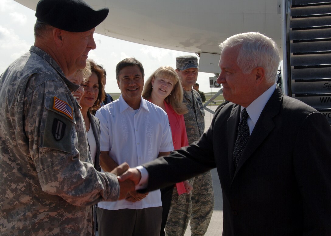 The Secretary Of Defense, Dr. Robert Gates is greeted by Maj. Gen. Donald Goldhorn,The Adjutant General of the Guam National Guard,
as he arrives at Andersen Air Force Base on May 29. This is Dr. Robert Gates first visit to Andersen AFB as the Secretary Of Defense.  (U.S. Air Force by Airman 1st Class Courtney Witt)   