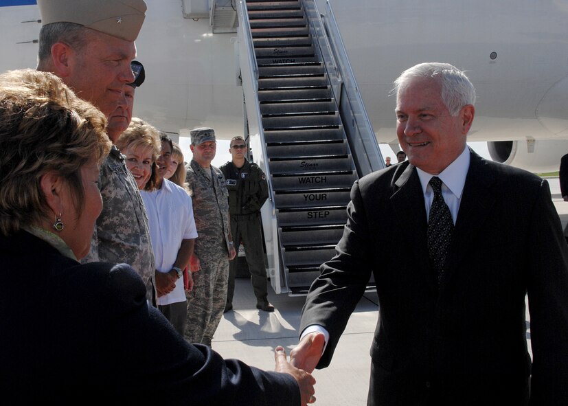 The Secretary Of Defense, Dr. Robert Gates is greeted by Rear Admiral William French commander of Navy Region Marianas and Mrs. French, as he arrives at Andersen Air Force Base on May 29. This is Dr. Robert Gates first visit to Andersen AFB as the Secretary Of Defense. (U.S. Air Force by Airman 1st Class Nichelle Griffiths)   