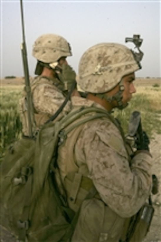 U.S. Marines with Bravo Company, 1st Battalion, 6th Marine Regiment, 24th Marine Expeditionary Unit, International Security Assistance Force conduct operations in Garmsir, Afghanistan, on May 15, 2008.  