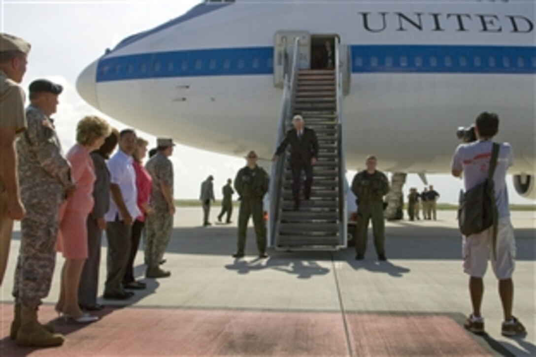 U.S. Defense Secretary Robert M. Gates is greeted by Guamanian officials upon his arrival on Andersen Air Force Base, Guam, May 29, 2008. Gates is on a seven-day trip in the Pacific region to discuss security issues.  